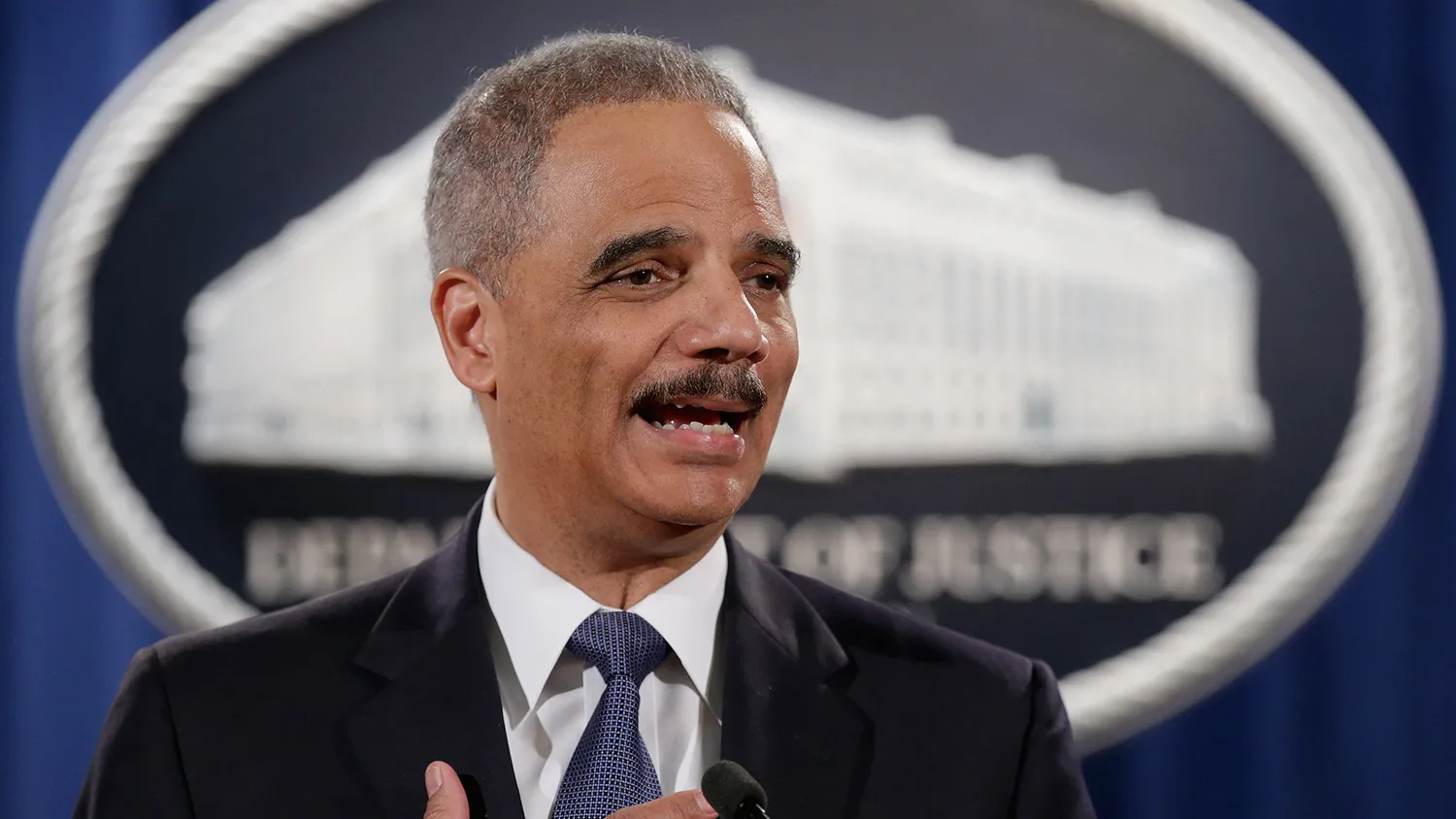 Attorney General Eric Holder delivers remarks about the Justice Department's findings related to two investigations in Ferguson, Missouri, at the Robert F. Kennedy Department of Justice Building March 4, 2015 in Washington, DC.

