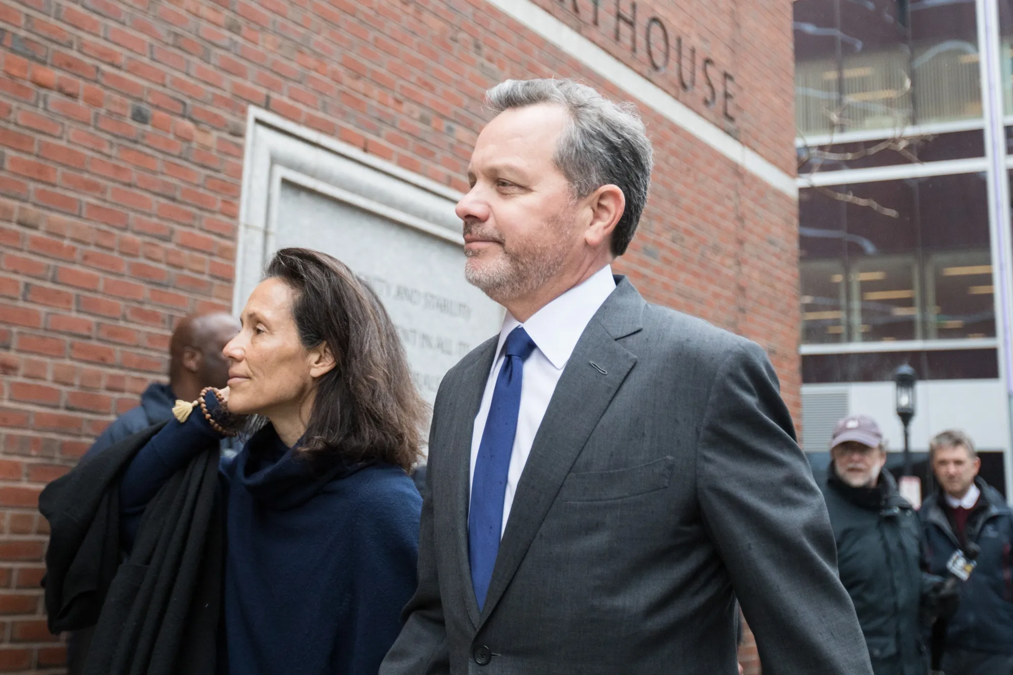 Bill McGlashan arrives at federal court in Boston in 2019.