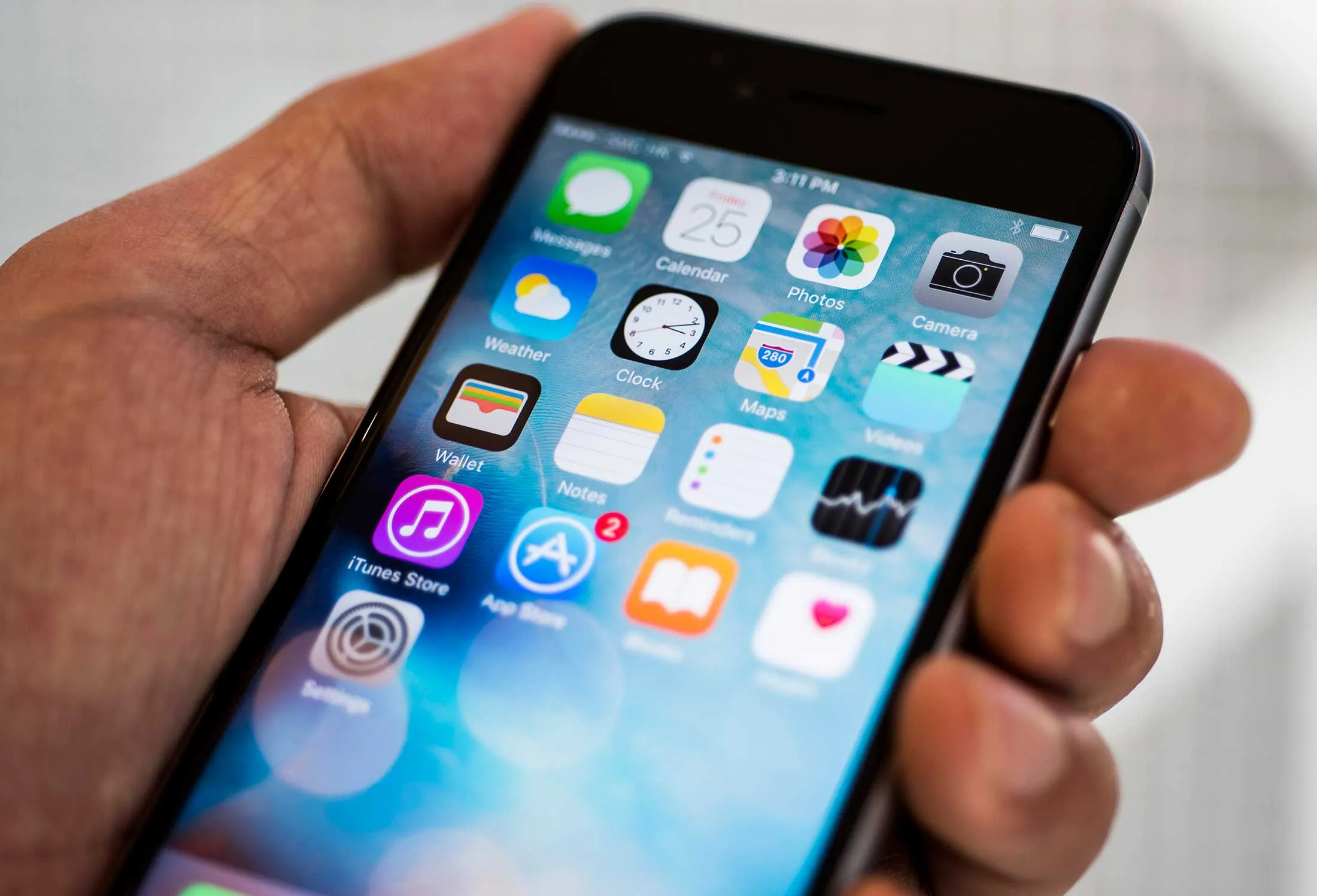 The home screen of an Apple Inc. iPhone 6s is seen in Hong Kong, China, on Friday, Sept. 25, 2015.
