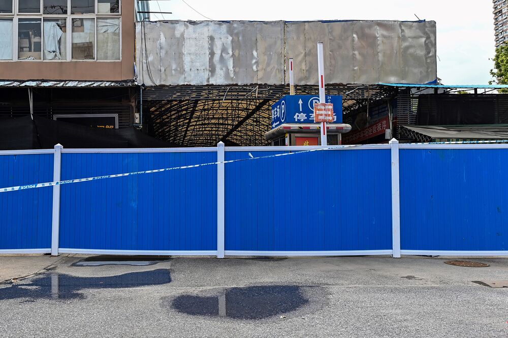 A barricade stands outside the closed Huanan Seafood Wholesale Market in Wuhan on April 1.