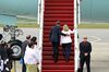 President Barack Obama and Secretary of State Hillary Clinton board Air Force One as they leave Myanmar at Yangon International airport in 2012.



