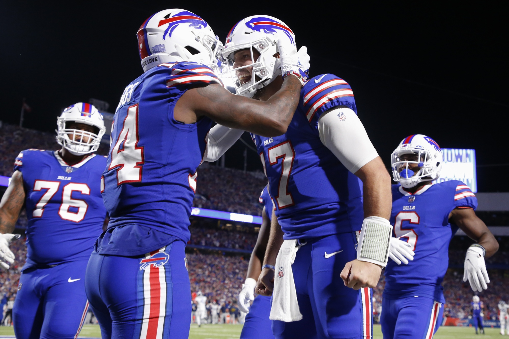 Diggs Scores 3 TDs for Bills in 41-7 Rout of Titans - Bloomberg