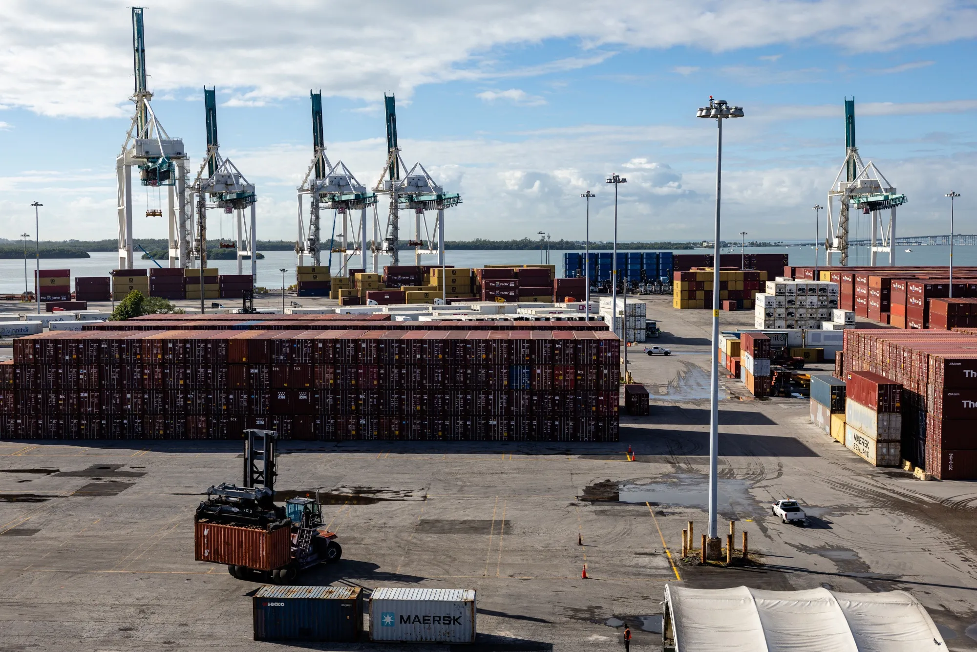 Shipping containers and cranes at PortMiami in Miami.