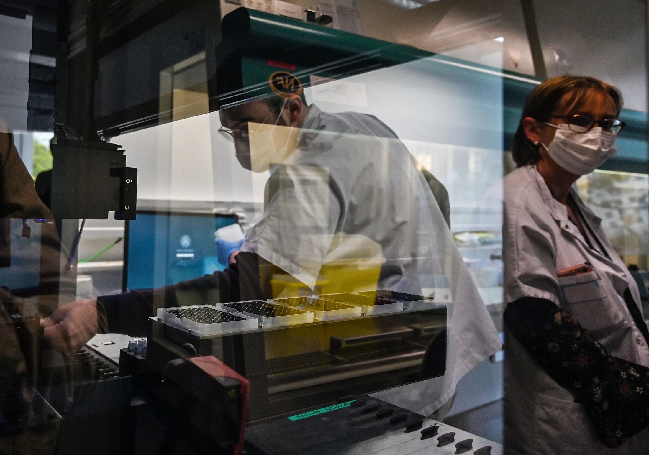 Medical staff prepare nasal swabs for analysis&nbsp;at the Croix-Rousse hospital in Lyon, France, on April 21.