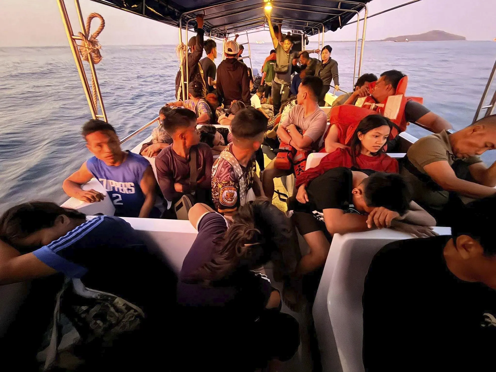 Passengers rescued from the M/V Trisha Kerstin 3 off the coast of Isabela City, Basilan Province, on Jan. 26.