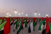 UAE Flags And Construction Cranes Building The Island Near Jumeira Beach Dubai