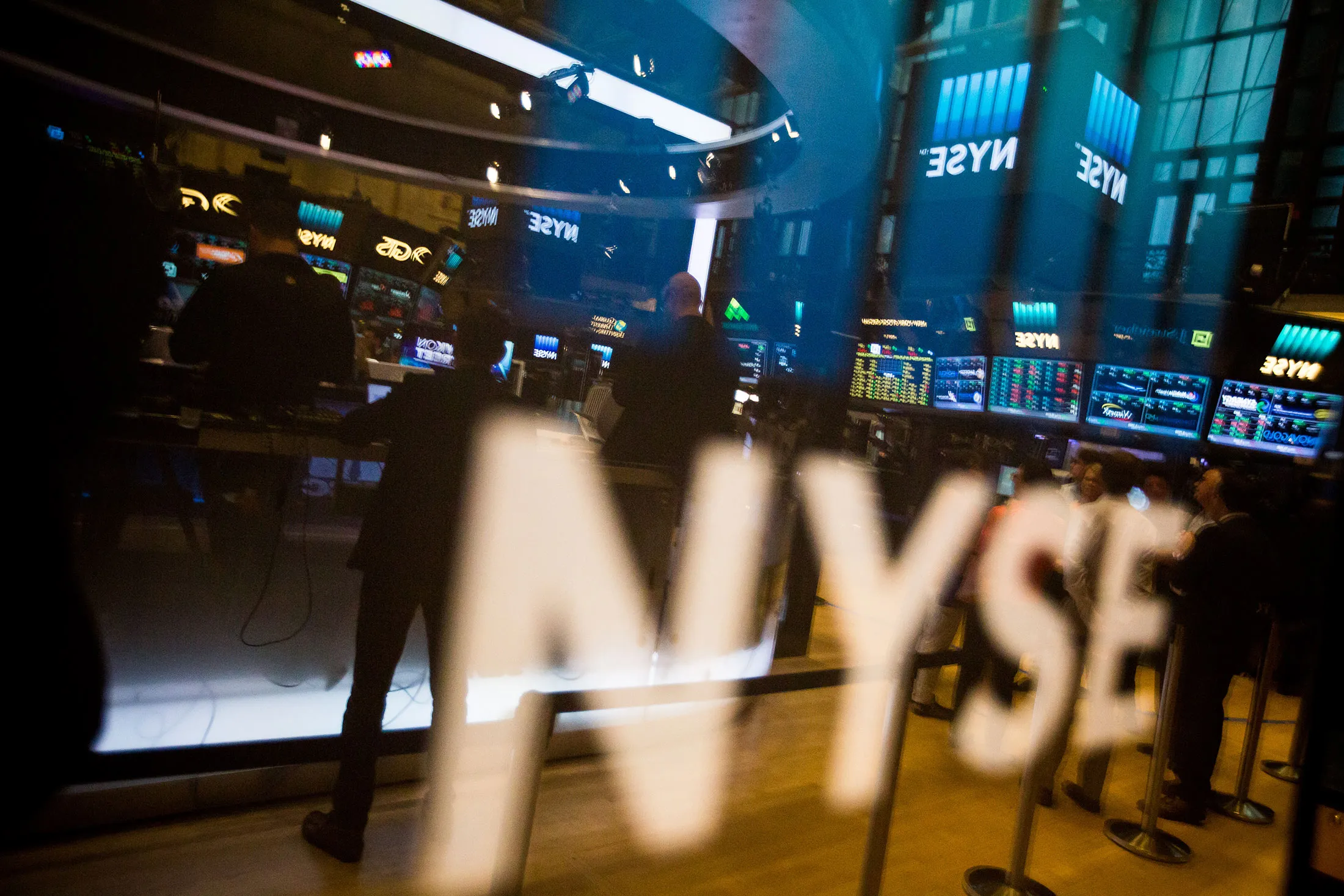 Signage is displayed on the window of the New York Stock Exchange (NYSE) in New York.
