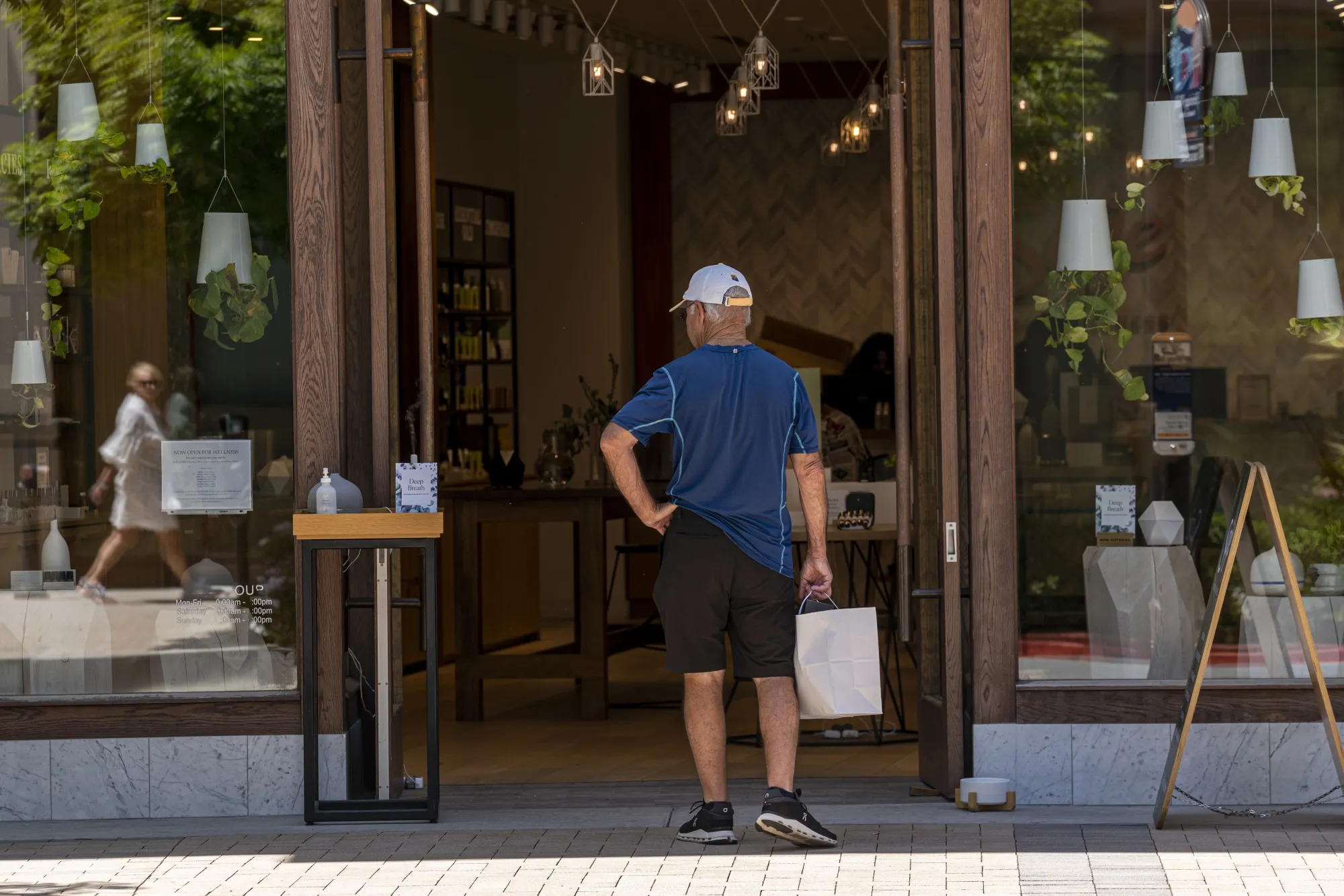 A shopper enters a store in Walnut Creek, California.