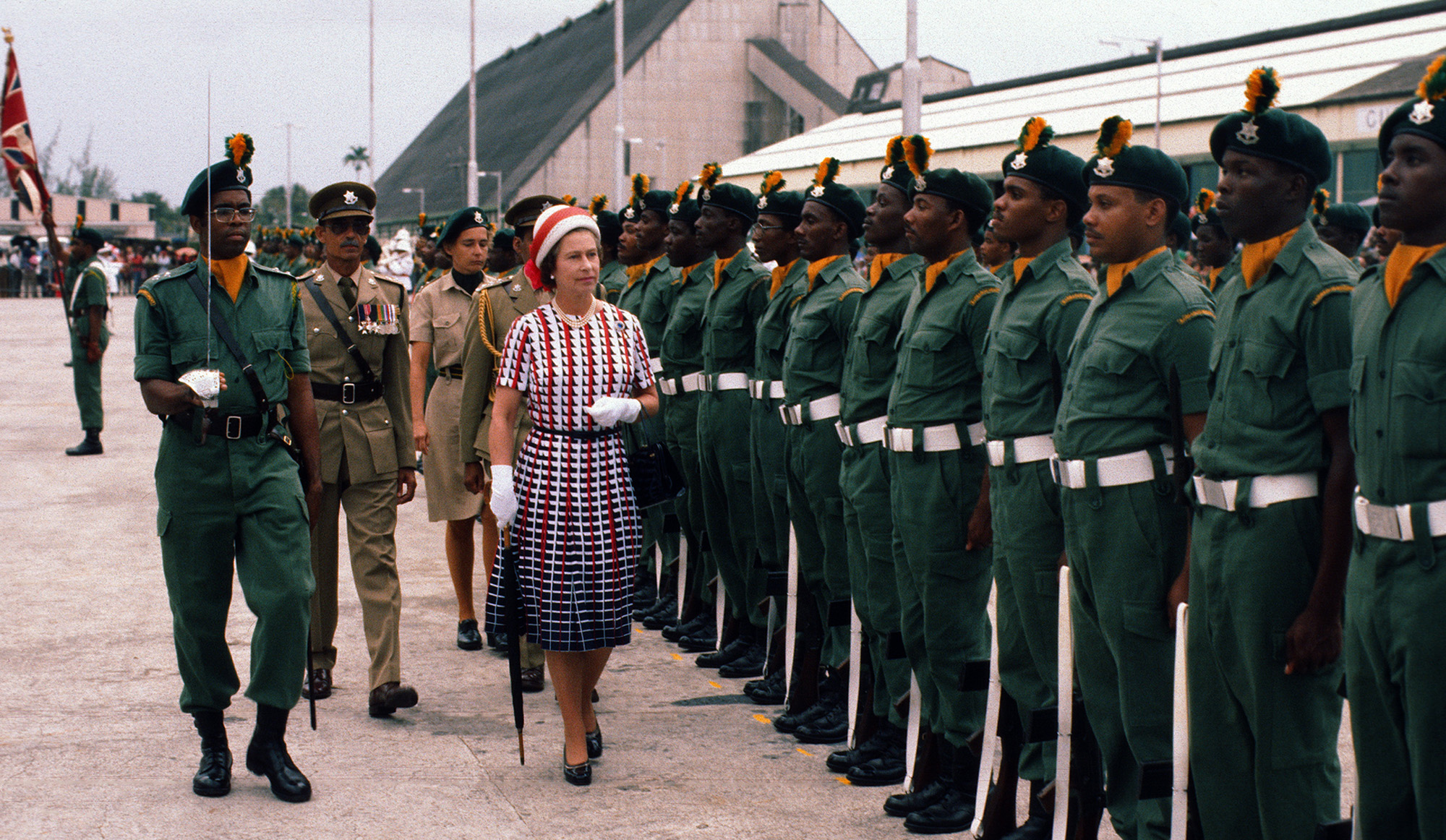 Queen Elizabeth ll inspects a guard of honour as she arrives&nbsp;in Barbados in 1977.