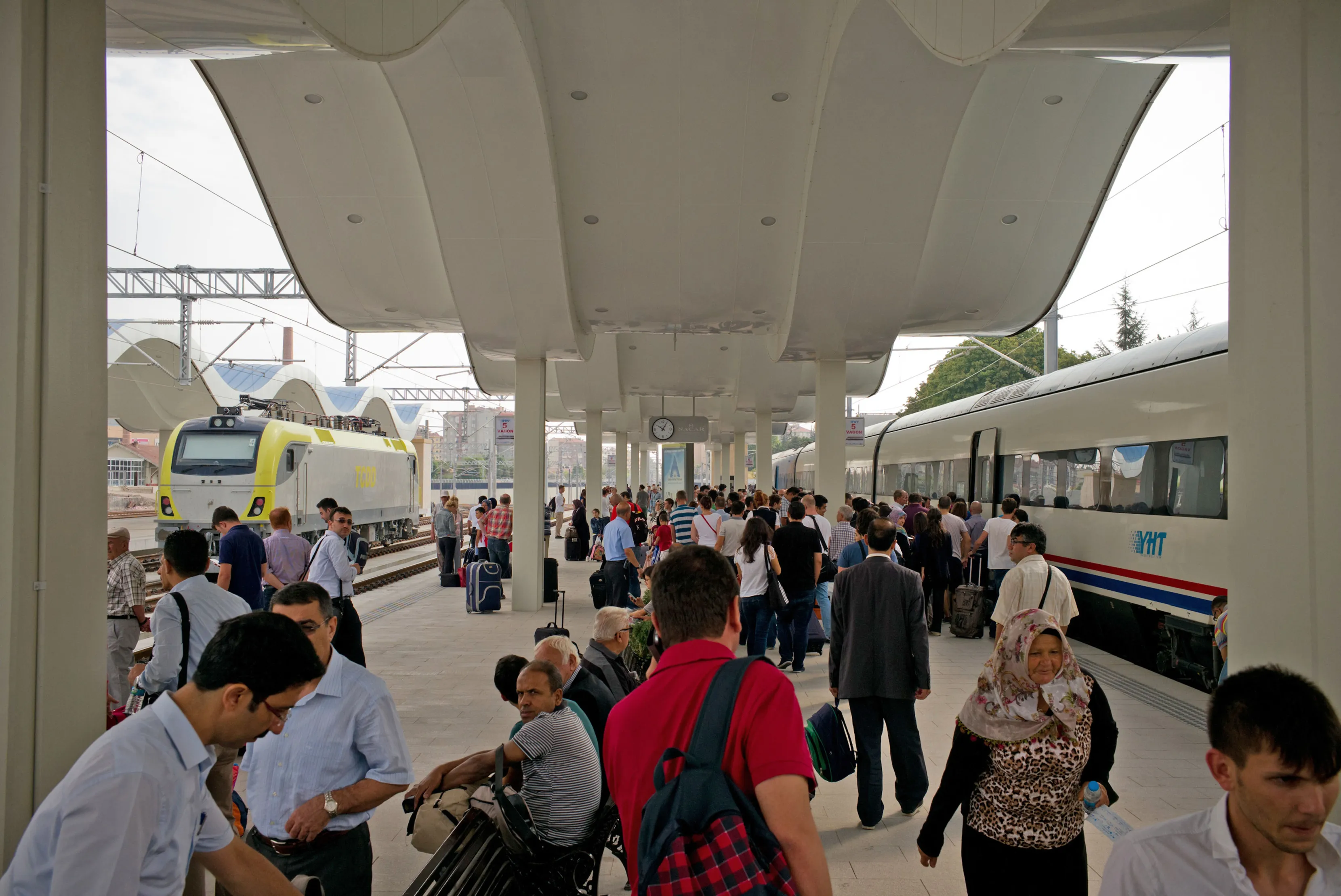 Passengers prepare to board a passenger train between Istanbul and Ankara in Eskisehir train station.&nbsp;