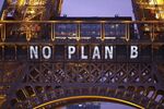 The slogan &quot;No Plan B&quot; is projected on the Eiffel Tower as part of the World Climate Change Conference in 2015 in Paris.
