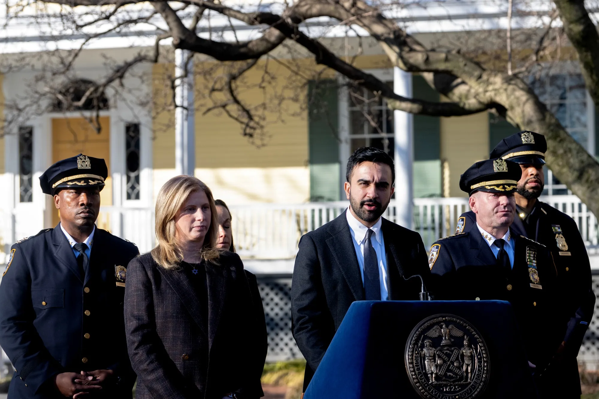 Jessica Tisch, second left, and Zohran Mamdani, center, during a news conference at Gracie Mansion in New York on March 9.