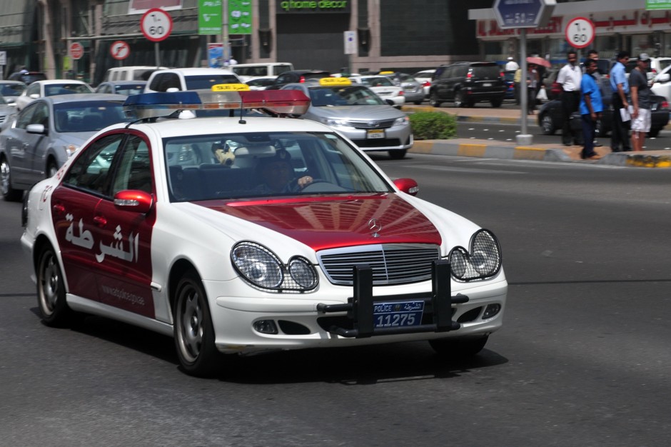 An Abu Dhabi police car patrols the streets. 