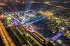 An aerial view of colorful lights switched on in Alibaba headquarters for the upcoming Single's Day, also known as Double 11, a shopping holiday founded by Alibaba and popular among young Chinese people, in Hangzhou city, east China's Zhejiang province, 9 November 2019. (Imaginechina via AP Images)