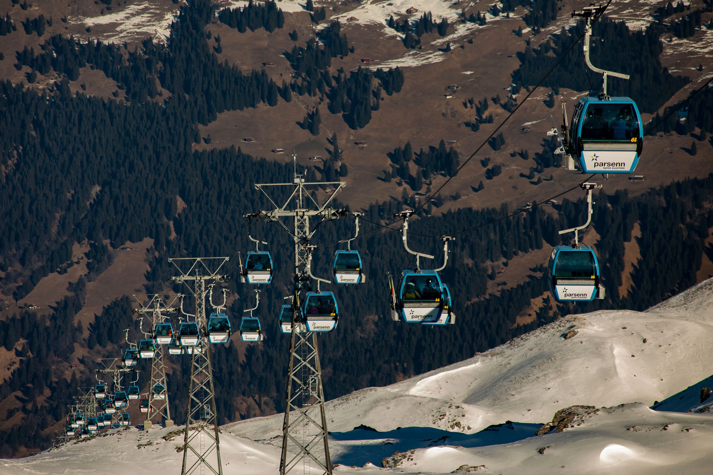 Cable cars ascend the&nbsp;slopes of the Parsenn ski resort in Davos, Switzerland, on&nbsp;Jan. 7.