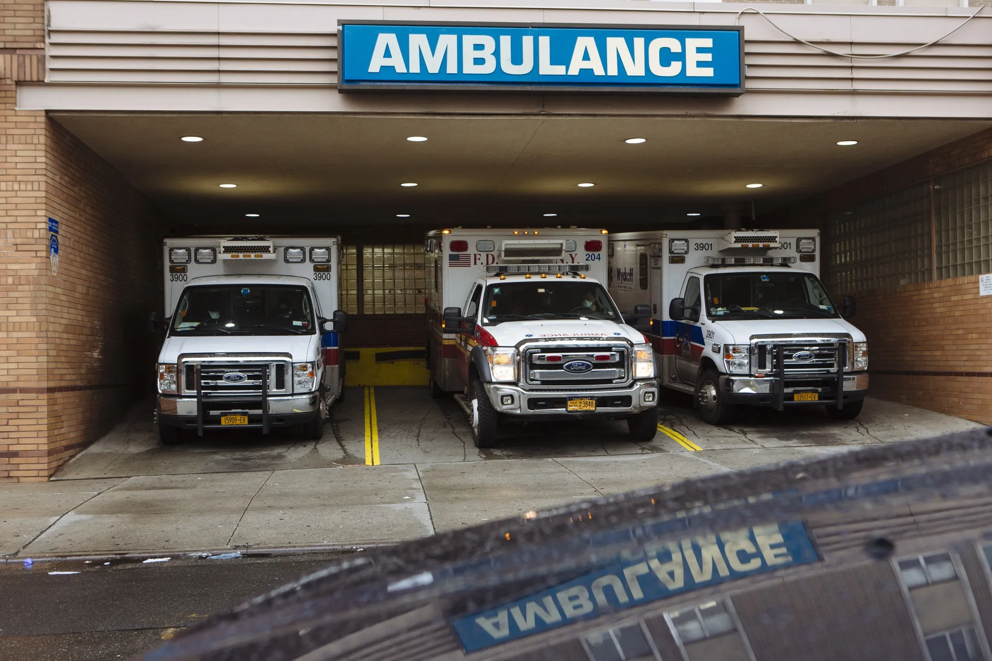 Ambulances sit parked outside an emergency room in New York on April 3.