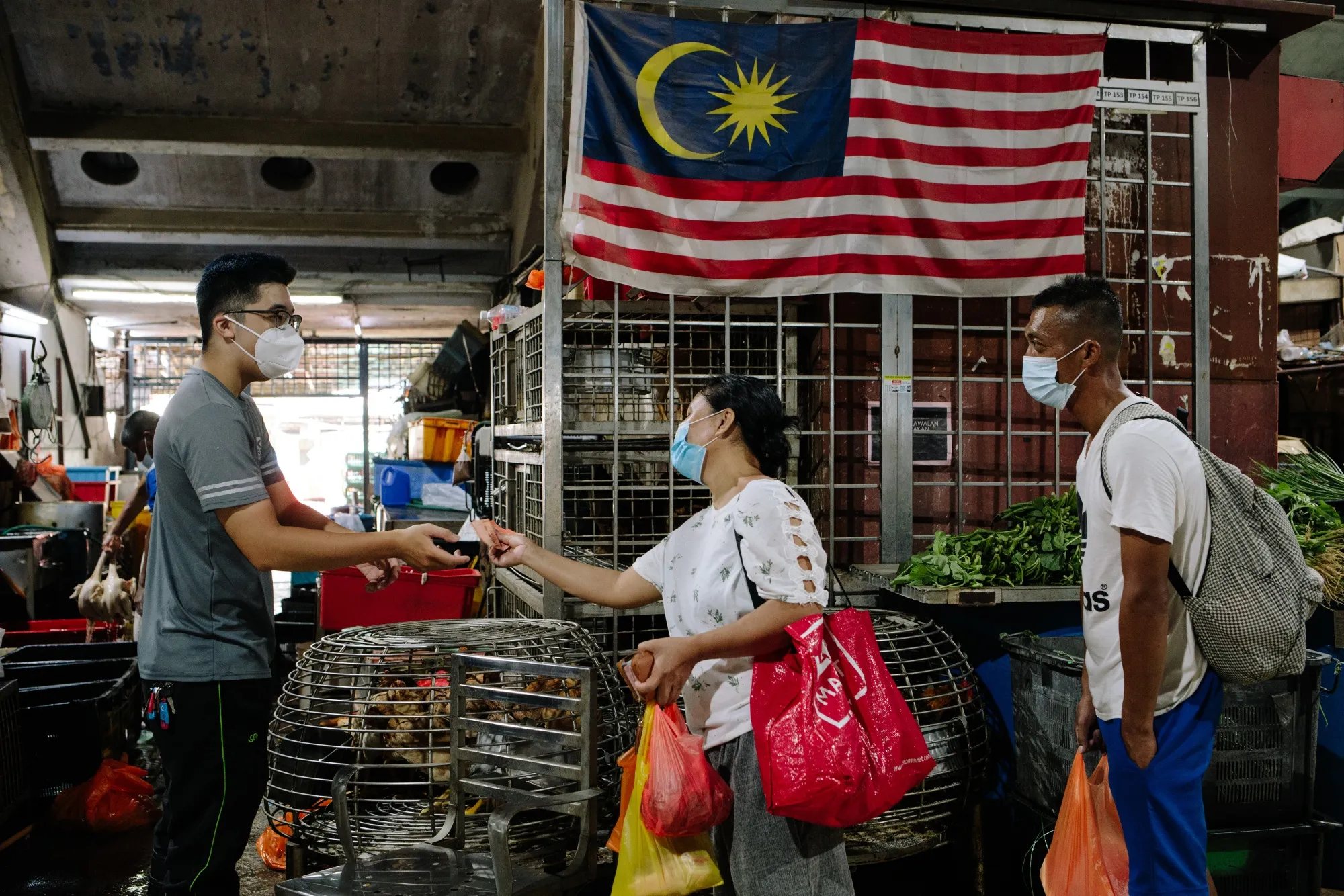 Shoppers at a market in Kuala Lumpur&nbsp;on Feb. 9.