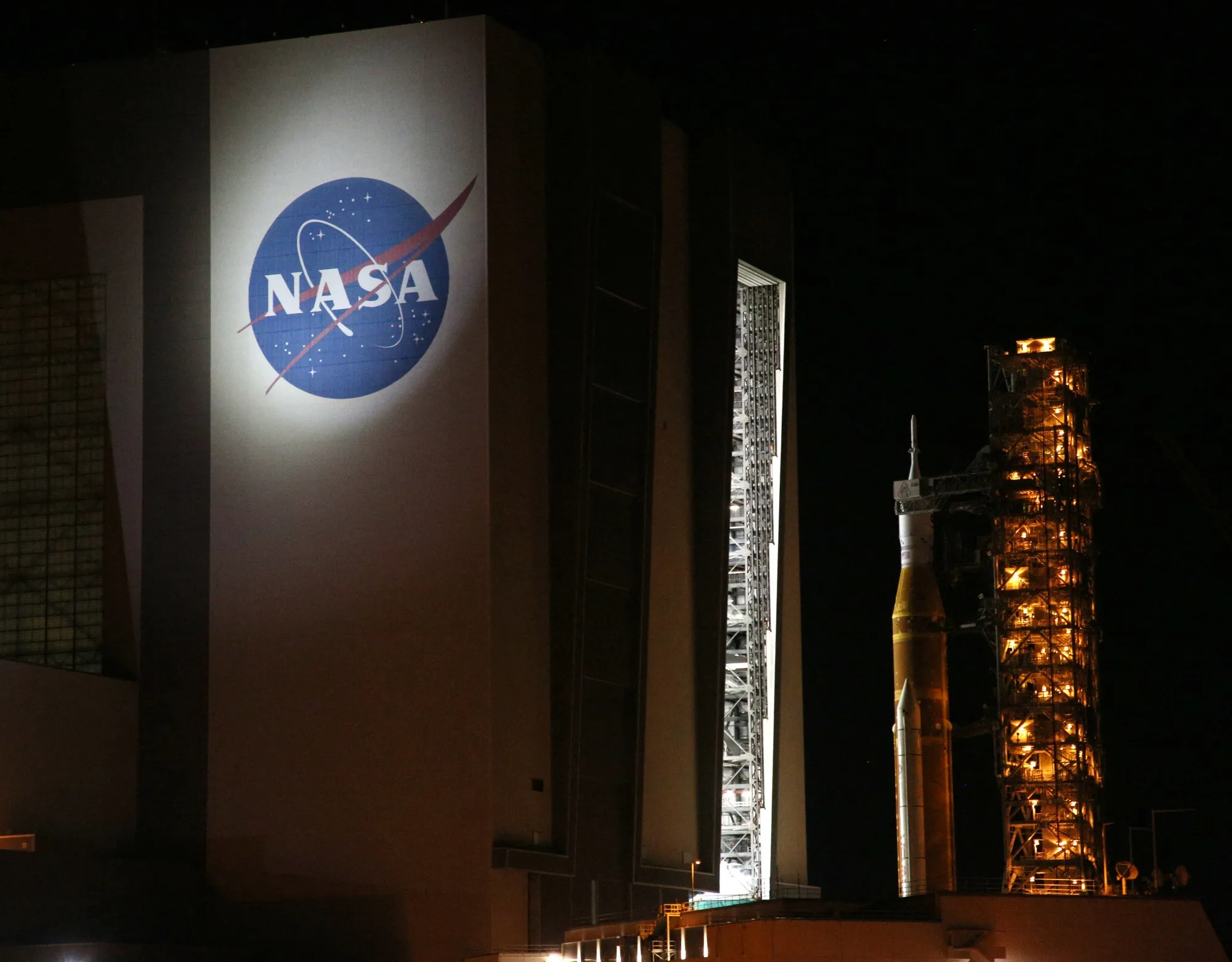 Mobile launcher 1 containing the Artemis II Space Launch System (SLS) rocket and Orion spacecraft arrives at the Vehicle Assembly Building from Launch Pad 39B at the Kennedy Space Center in Cape Canaveral, Florida, in February.