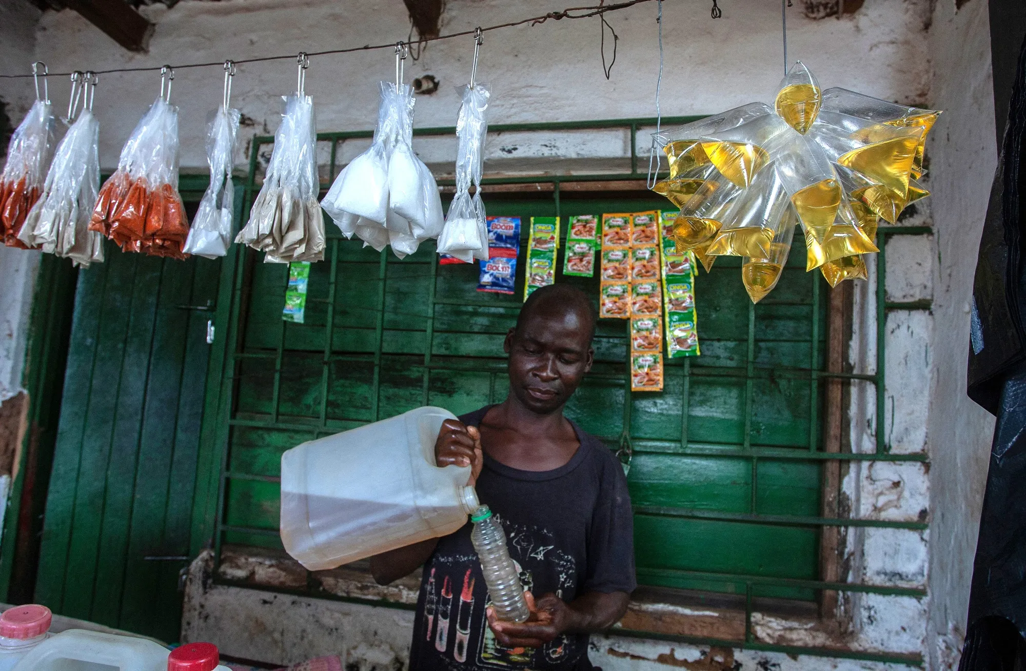 A cooking oil seller in&nbsp;Lilongwe, Malawi.