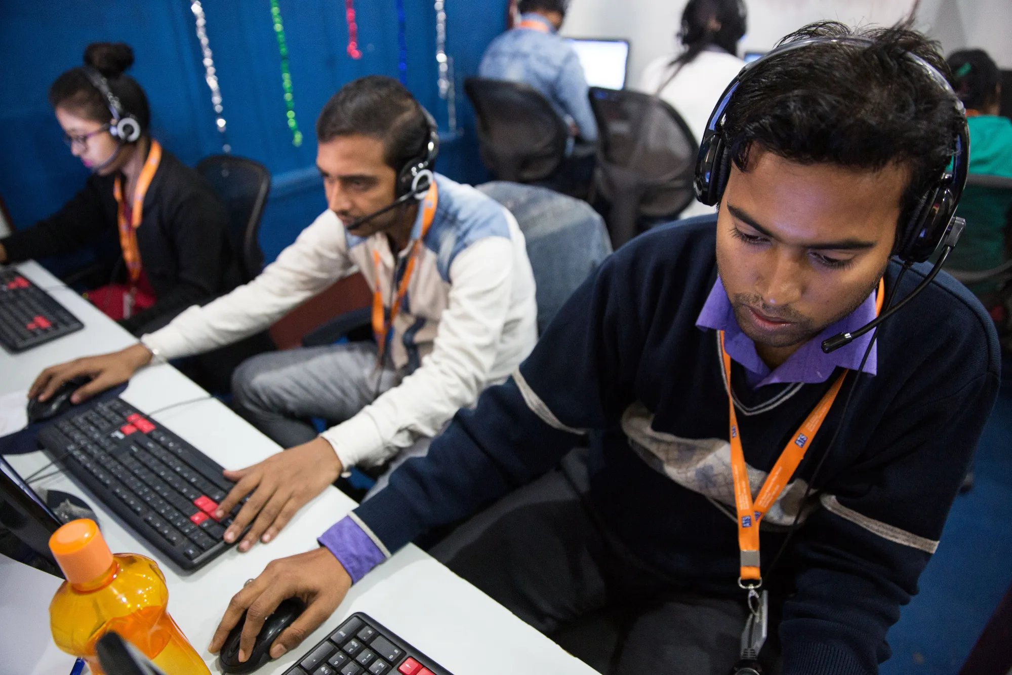 Employees at a call center in Kolkata, India.  Photograph: Taylor Weidman/Bloomberg