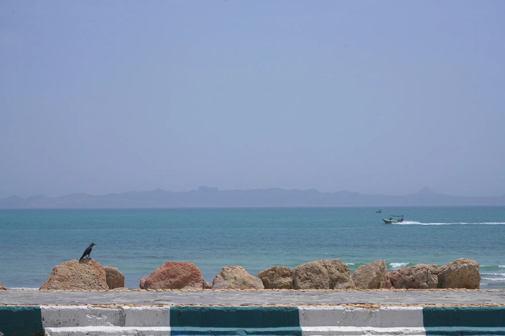 Boats travel near the seafront&nbsp;on Qeshm Island, Iran in the Strait of Hormuz.