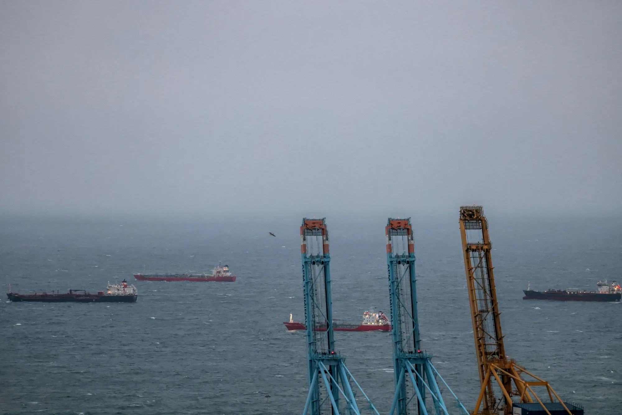 Cargo vessels offshore near the port of Barcelona, Spain, on Thursday, March 5, 2026. Spanish Prime Minister Pedro Sánchez said he won’t yield to threats over his objections to the US and Israeli war in Iran.