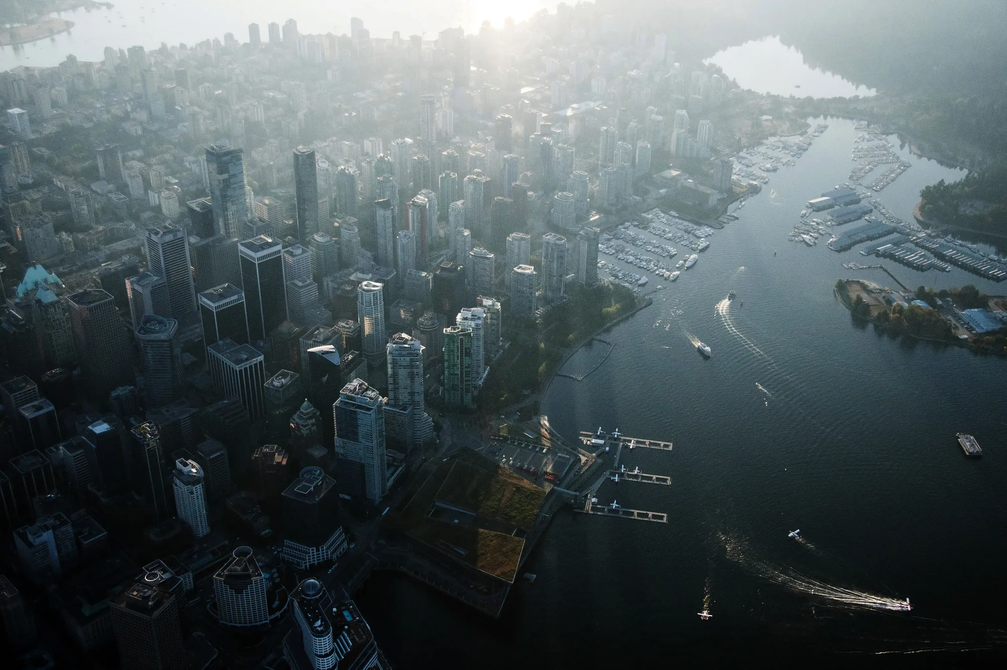 Commercial and residential buildings stand in this aerial photograph taken above Vancouver, British Columbia.