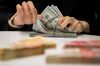 Counting of U.S. Dollars Banknotes At A Hang Seng Bank Branch