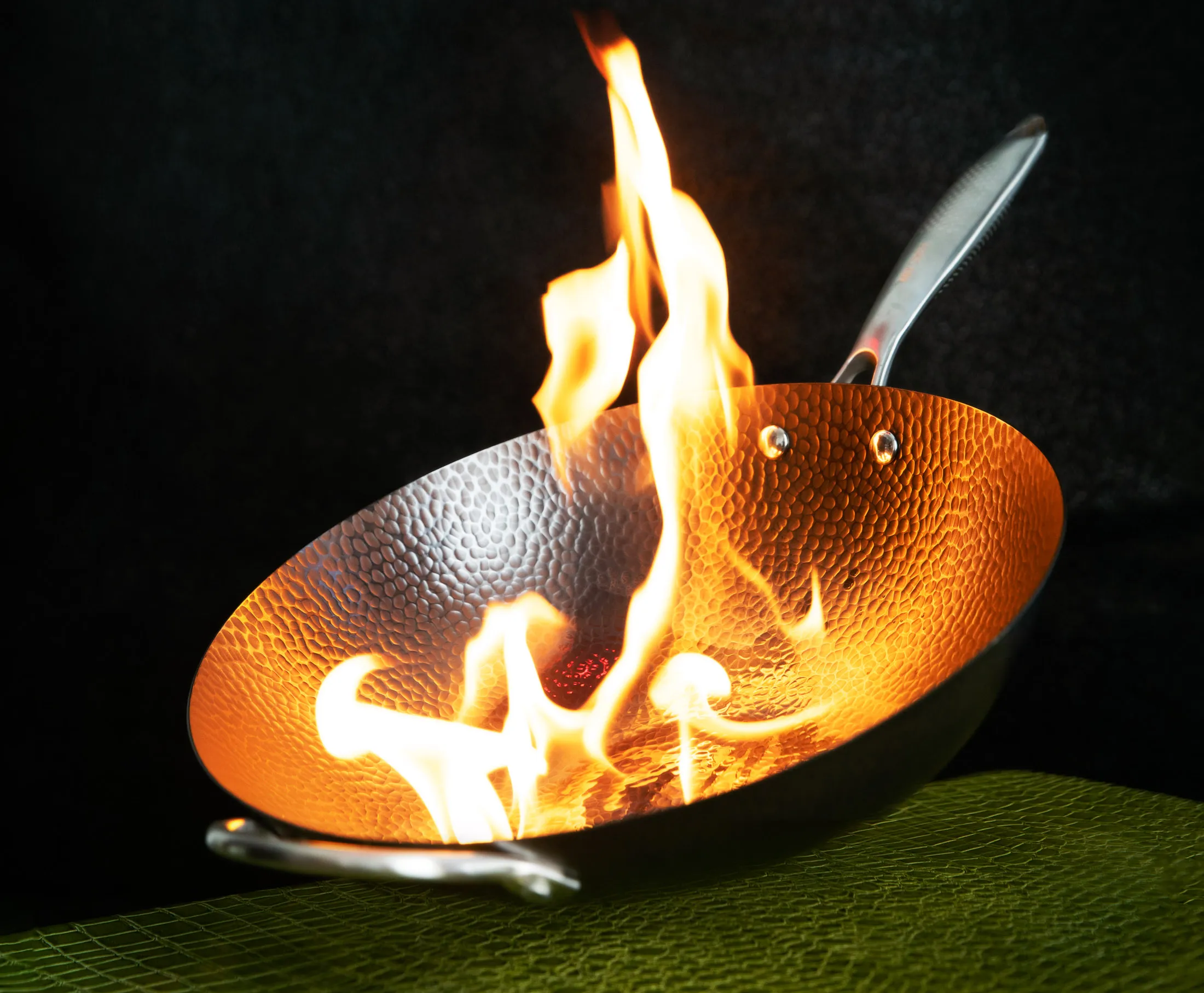 The dimpled surface helps keep Christopher Kimball’s Milk Street wok free of stickiness.