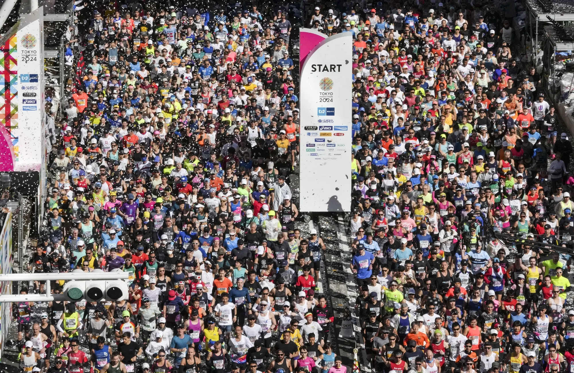 Runners at the start of the Tokyo Marathon 2024 in March.