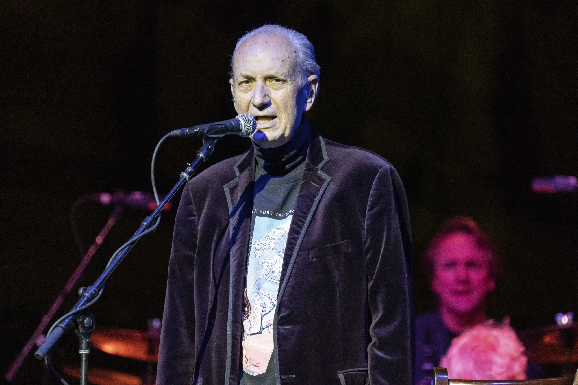 Mike Nesmith, of The Monkees, performs in Rosemont, Ill., on Nov. 5, 2021. Nesmith, the guitar-strumming member of the 1960s, made-for-television rock band The Monkees, died at home Friday of natural causes, his family said in a statement. He was 78. (Photo by Rob Grabowski/Invision/AP, File)