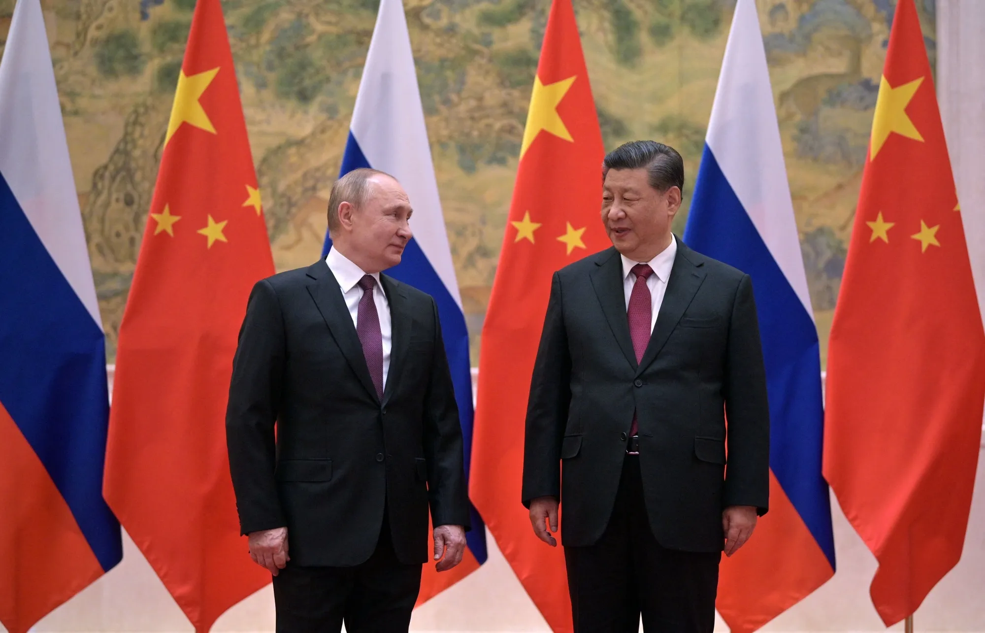 Vladimir Putin, left, and Xi Jinping in February.