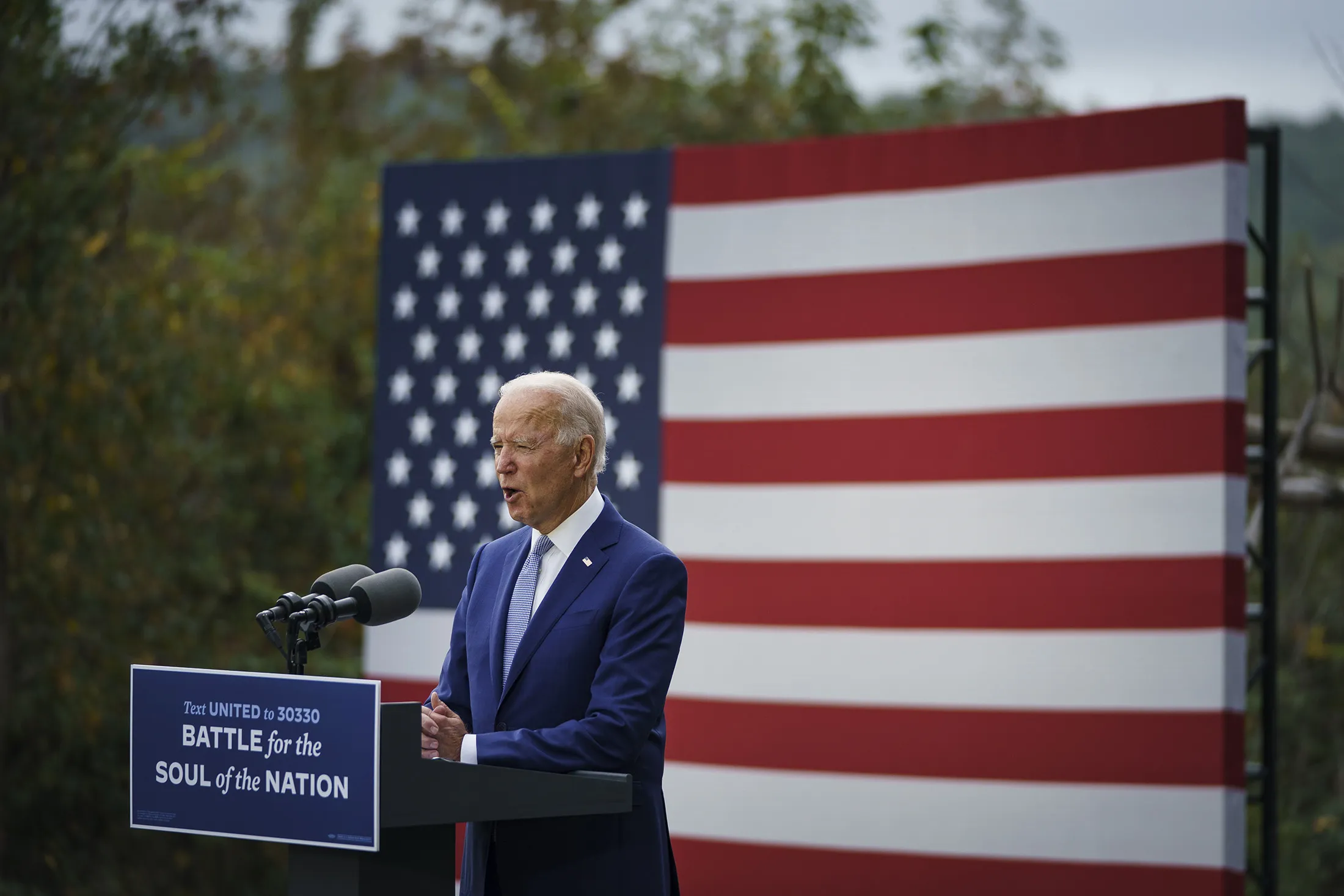 Joe Biden has promised new sanctions against Chinese firms that steal U.S. technology and threatened to cut them off from accessing the U.S. market and financial system.