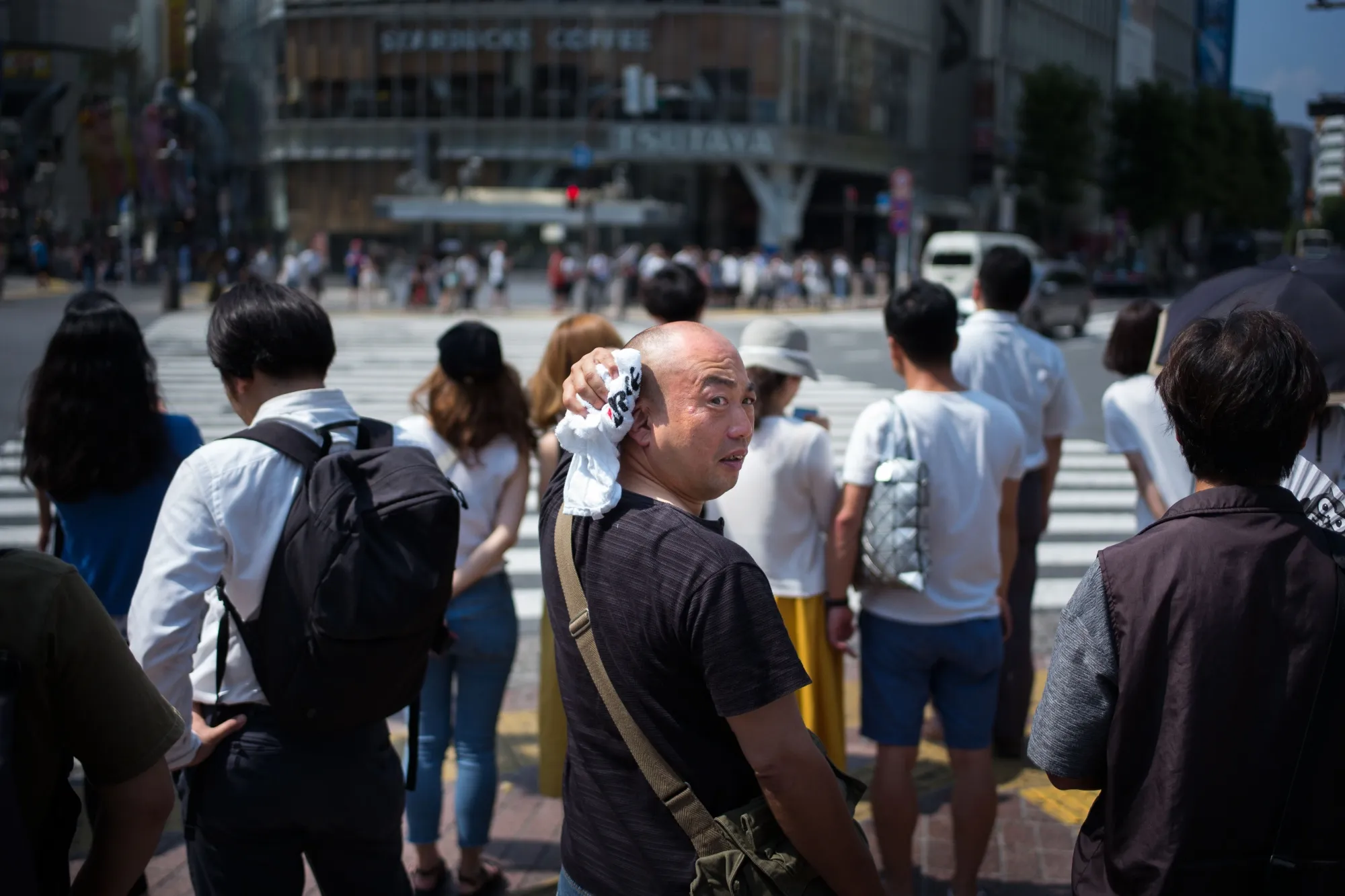 A man wipes perspiration in Tokyo on July 24.