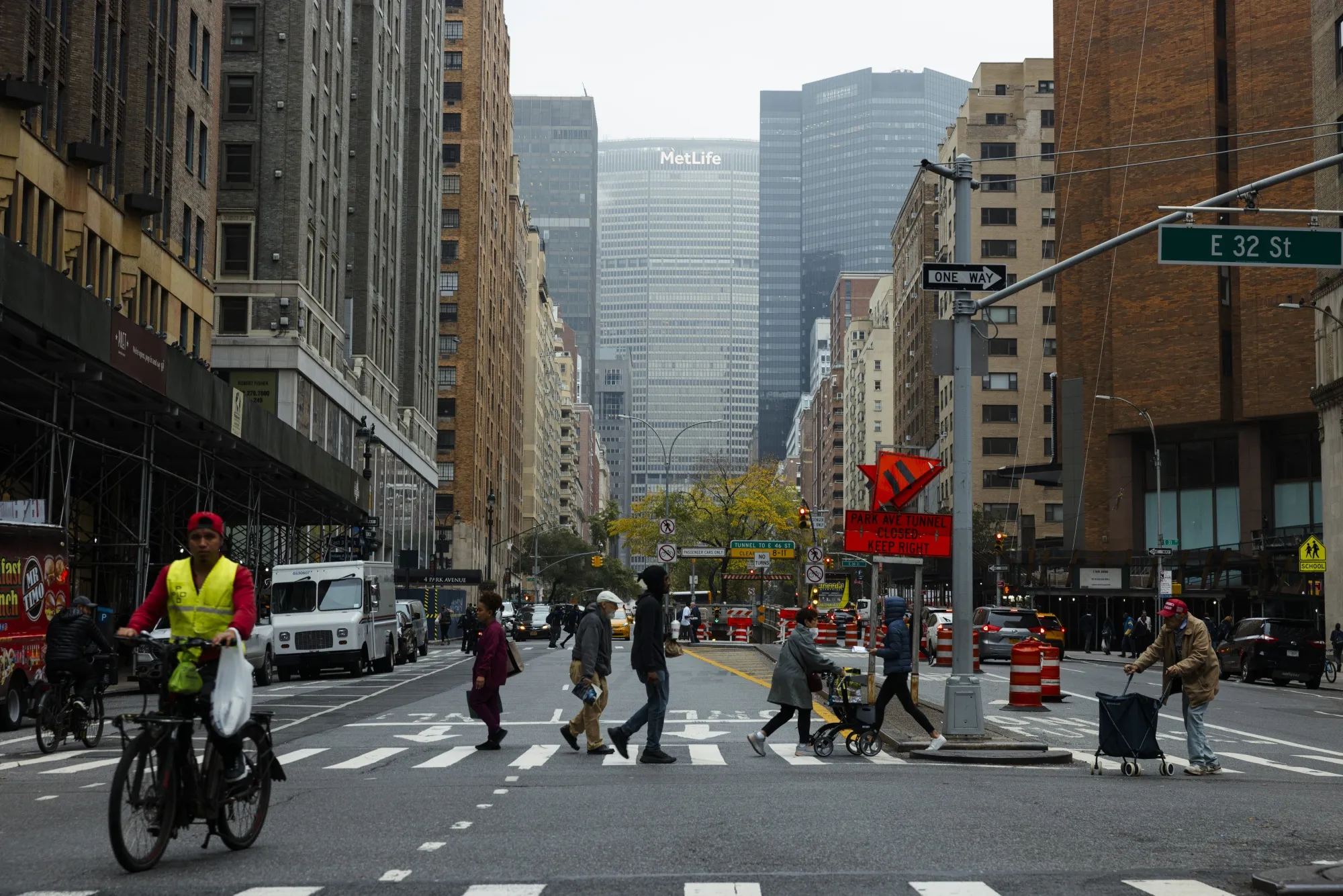 Pedestrians cross the street in NYC&nbsp;on Oct. 30, 2023. Walking activity has declined across the US since the start of the pandemic.