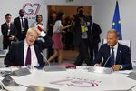 Boris Johnson and Donald Tusk at the G7 Summit on Aug. 25. 