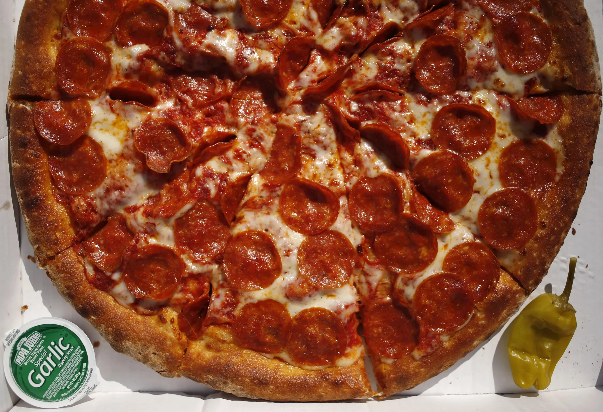 A Papa John's International Inc. pepperoni pizza pie.