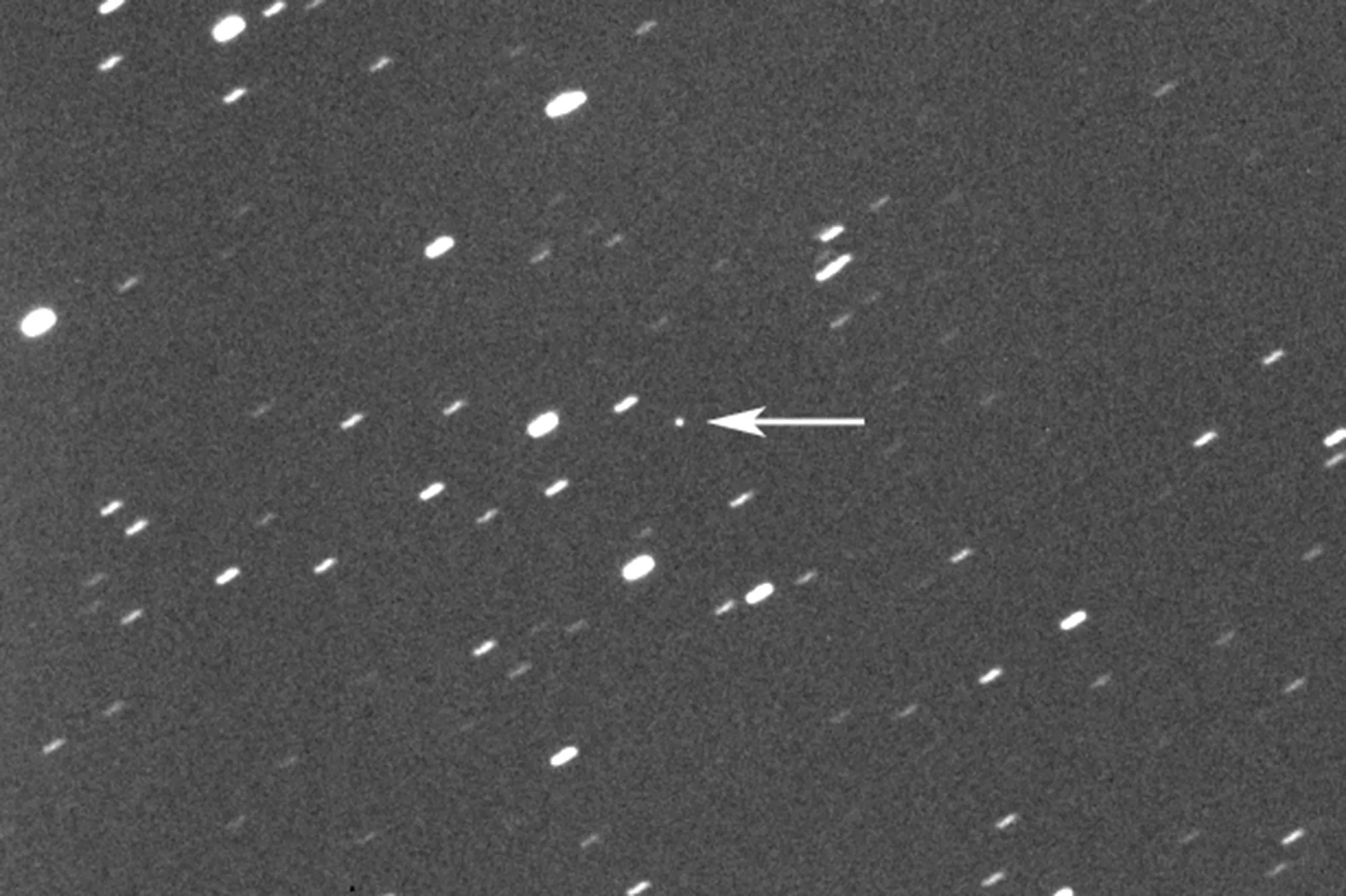 Asteroid 2023 DZ2, indicated by arrow at center, about 1.8 million kilometers (1.1 million miles) away from the Earth on March 22.