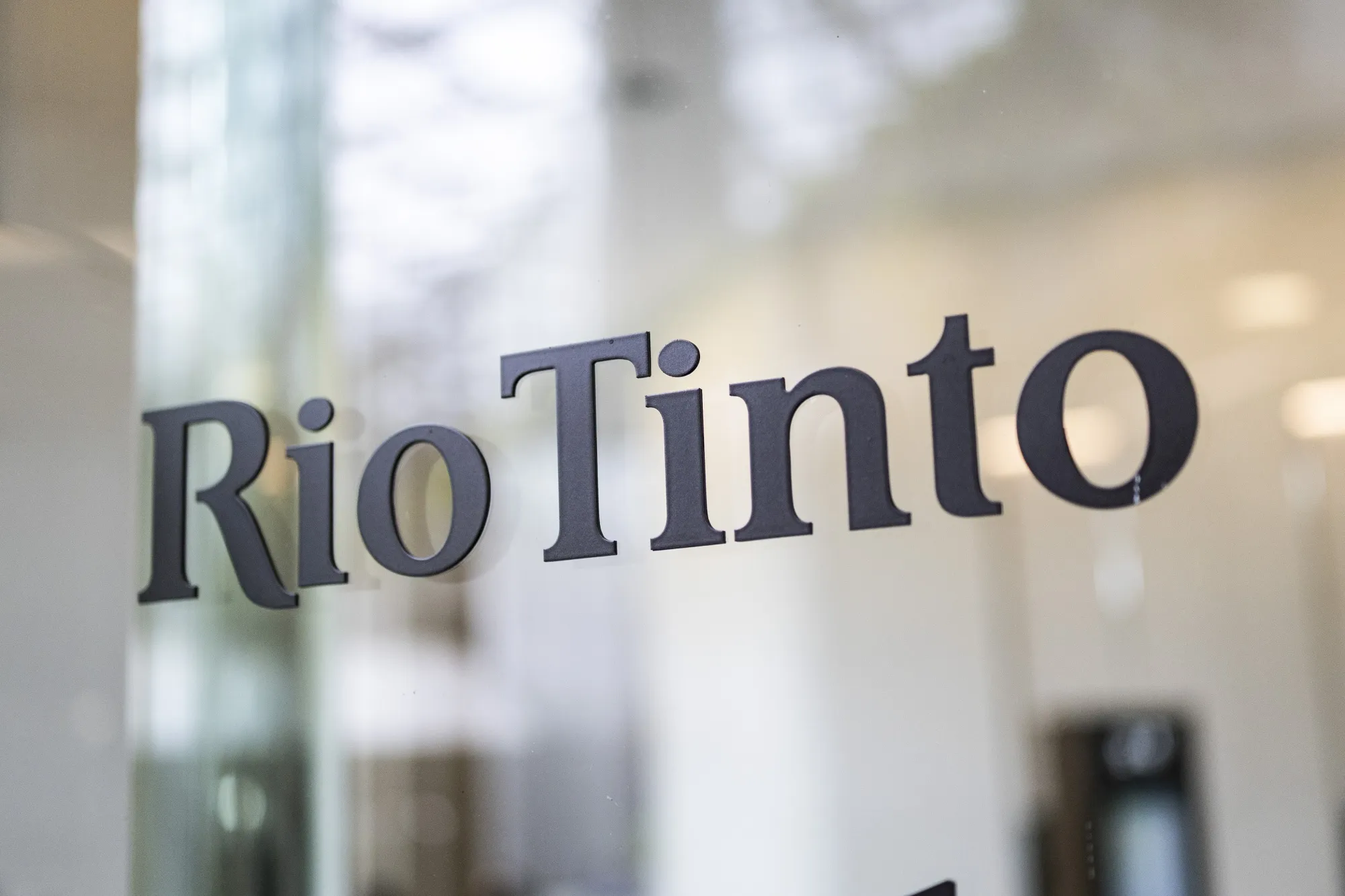 The Rio Tinto Group logo at Central Park tower, which houses the company's offices, in Perth, Australia, on Friday, Jan. 9, 2026. Rio is in talks to buy Glencore Plc to create the world’s biggest mining company with a combined market value of more than $200 billion, a little over a year after earlier talks between the two collapsed.