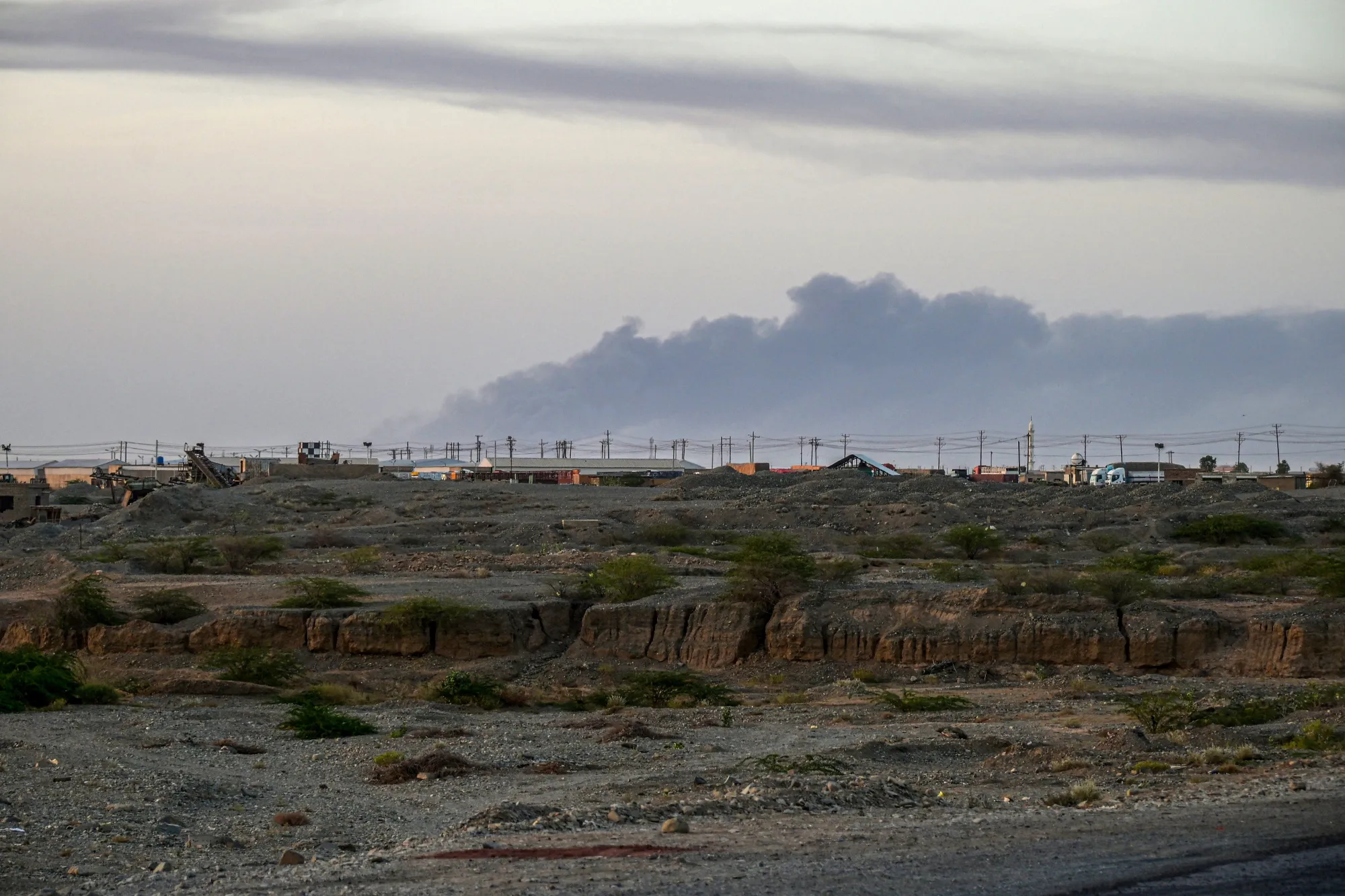 Smoke rises from the airport of Port Sudan following reported attacks early on May 4.