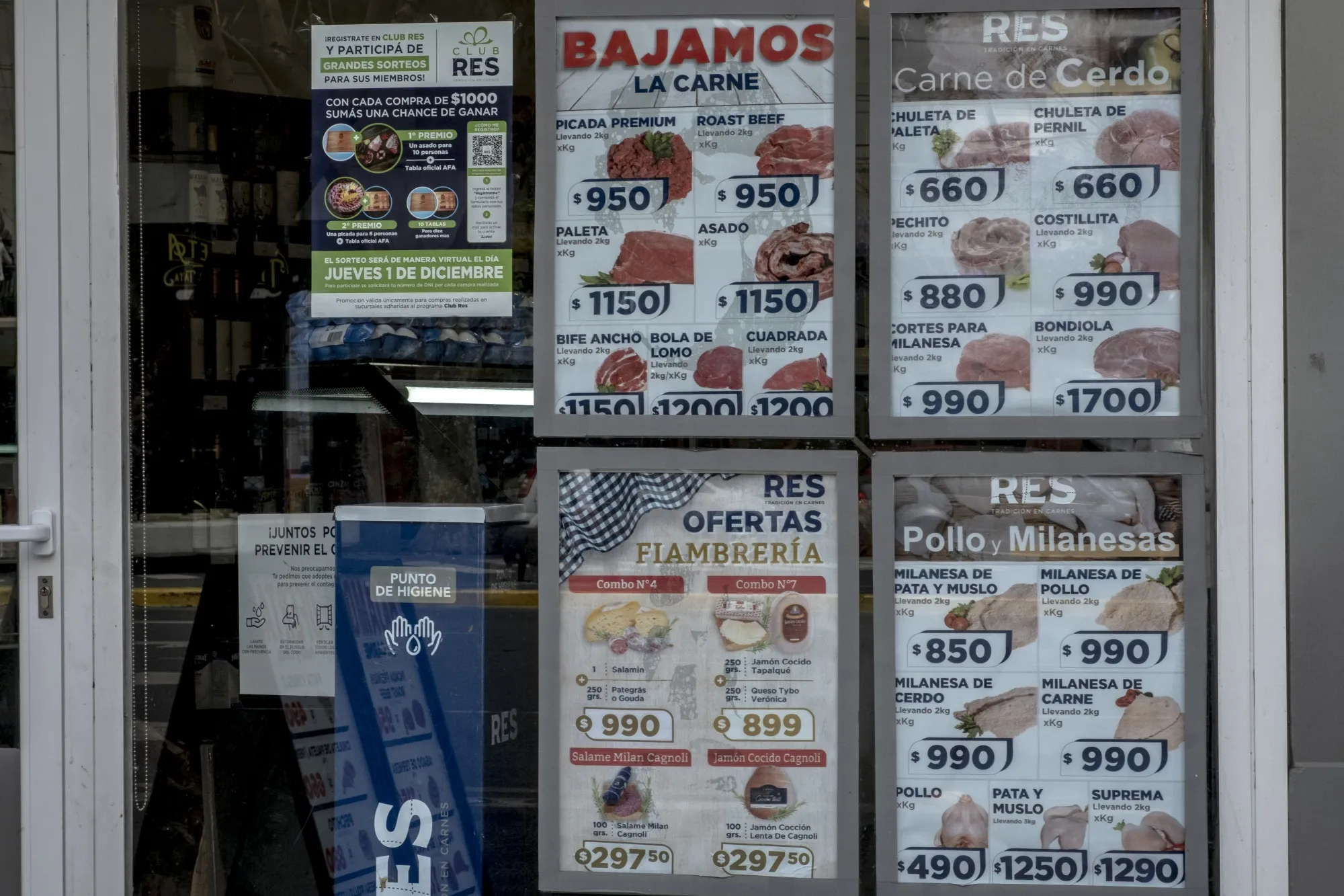 Signs with prices for meat outside a store in Buenos Aires, Argentina, on Friday, Nov. 18, 2022.&nbsp;