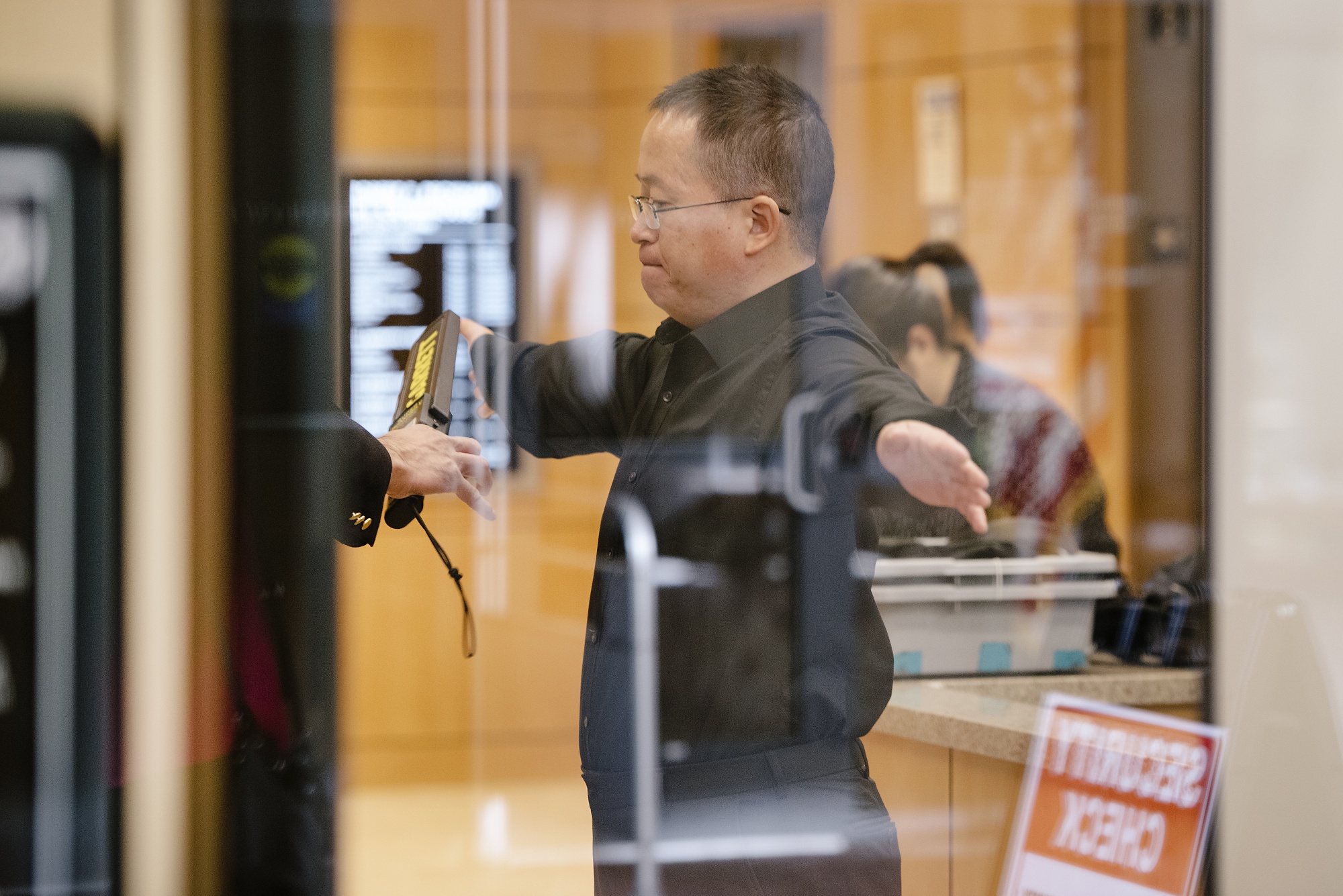 Hao Zhang, a professor at Tianjin University in China, goes through security while arriving at federal court in San Jose, California, on&nbsp;Oct. 2, 2019.