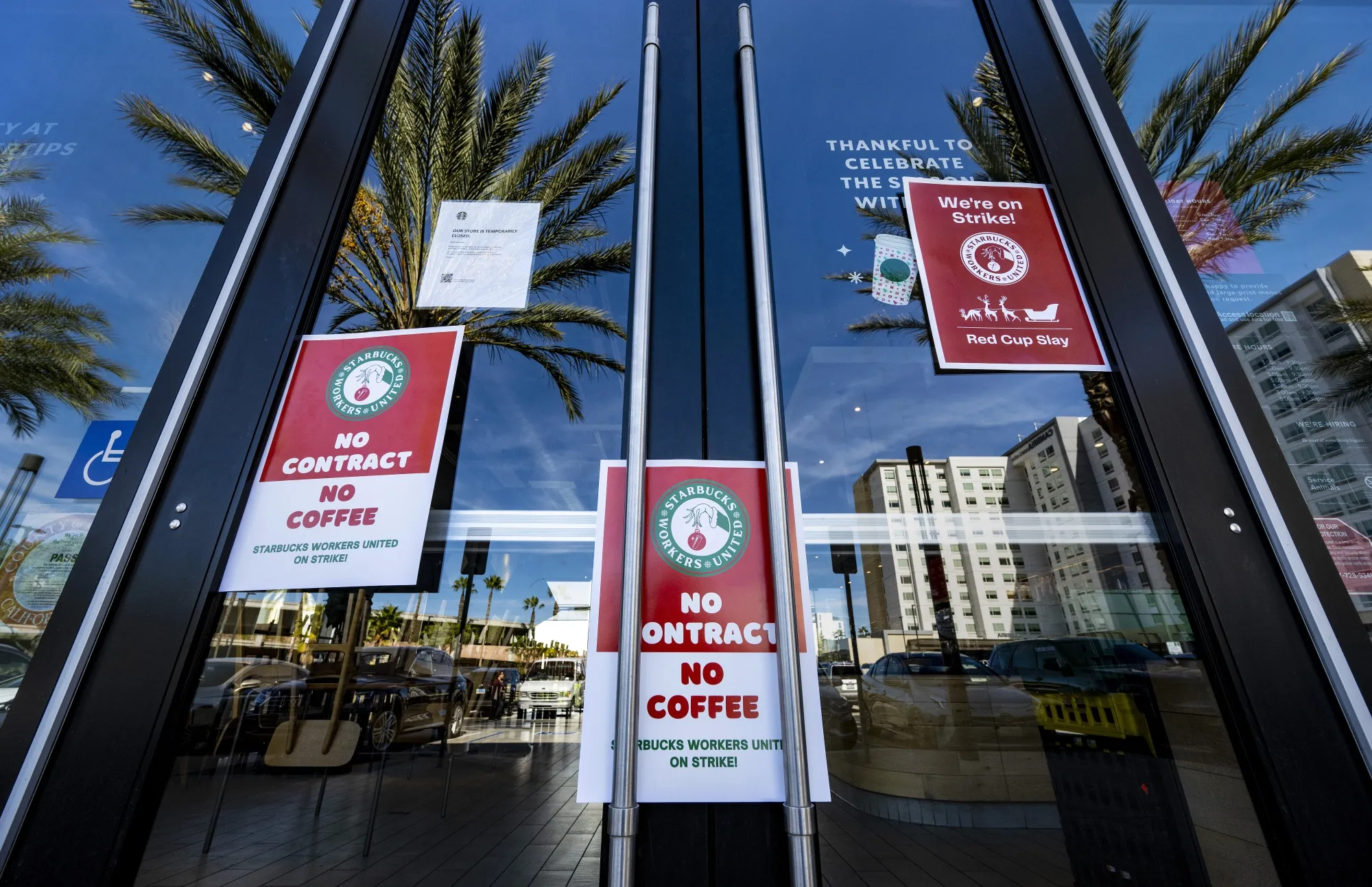 Strike posters at a closed unionized Starbucks Coffee outlet in California in 2022.