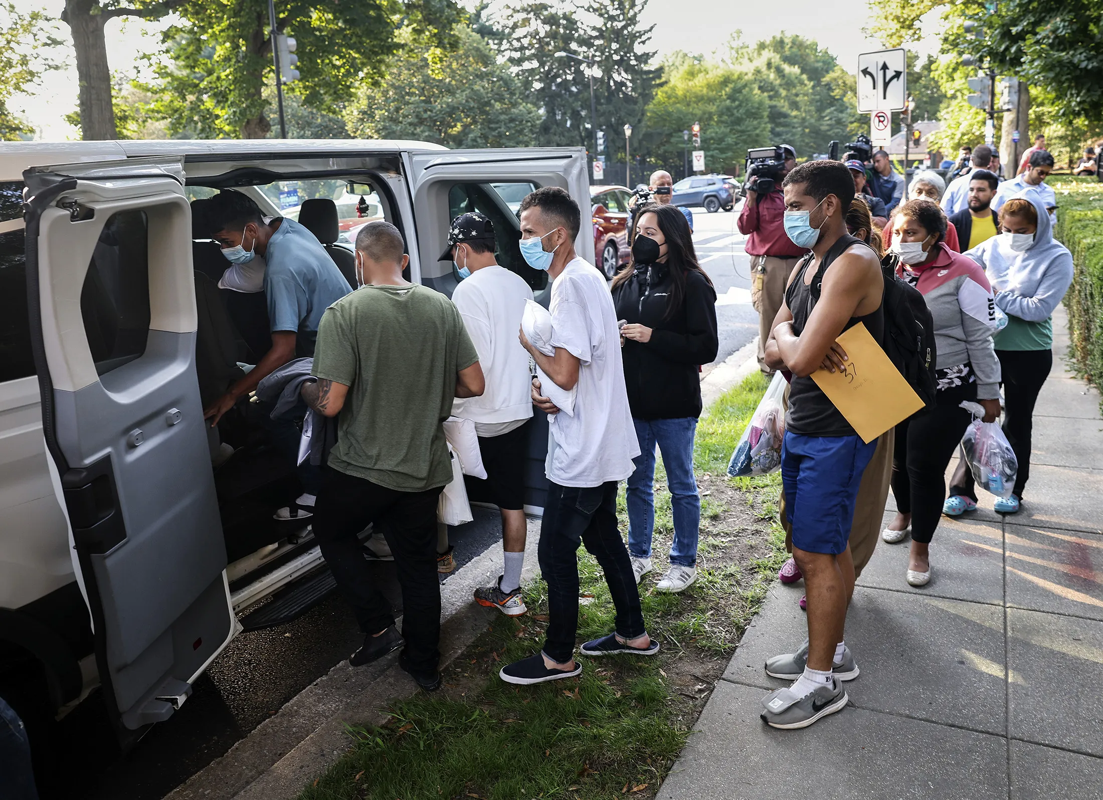 Migrants after being dropped off near the residence of Vice President Harris in Washington, D.C.&nbsp;on Sept.&nbsp;15.