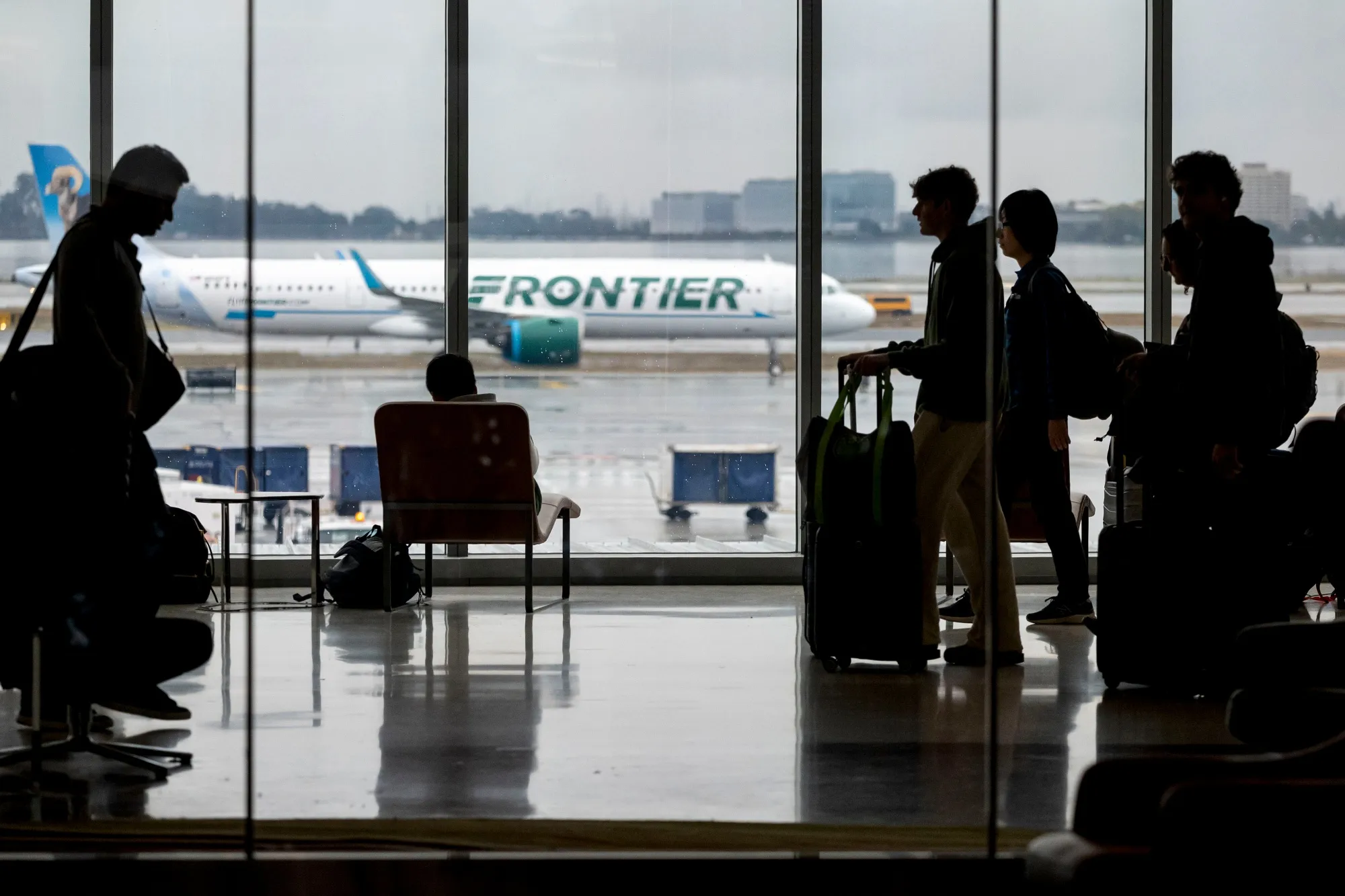 Travelers At SFO Airport Ahead Of Thanksgiving Holiday