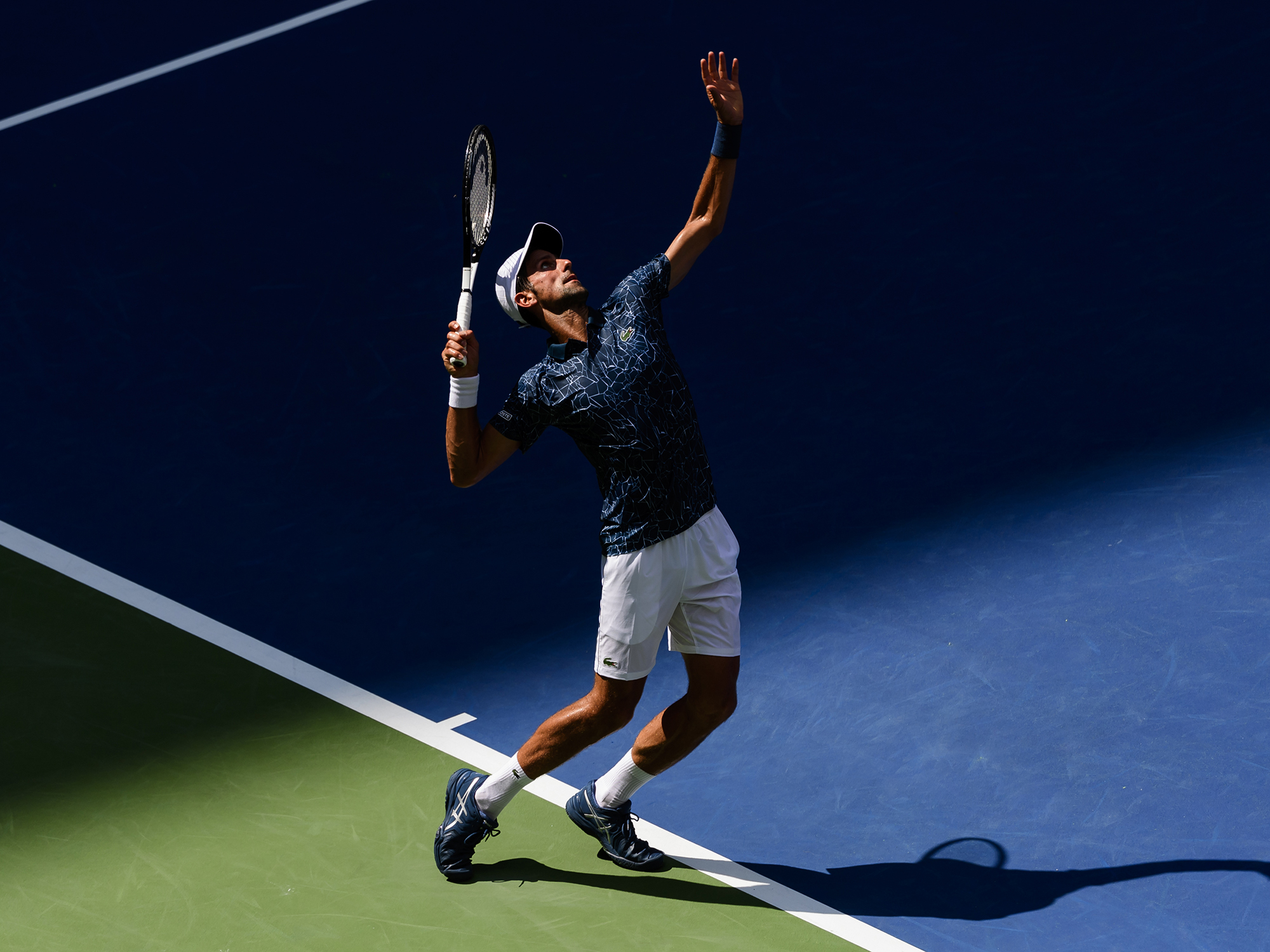 Novak Djokovic in action against Marton Fucsovics in the first round of the US Open in New York City&nbsp;on Aug.&nbsp;28, 2018.&nbsp;