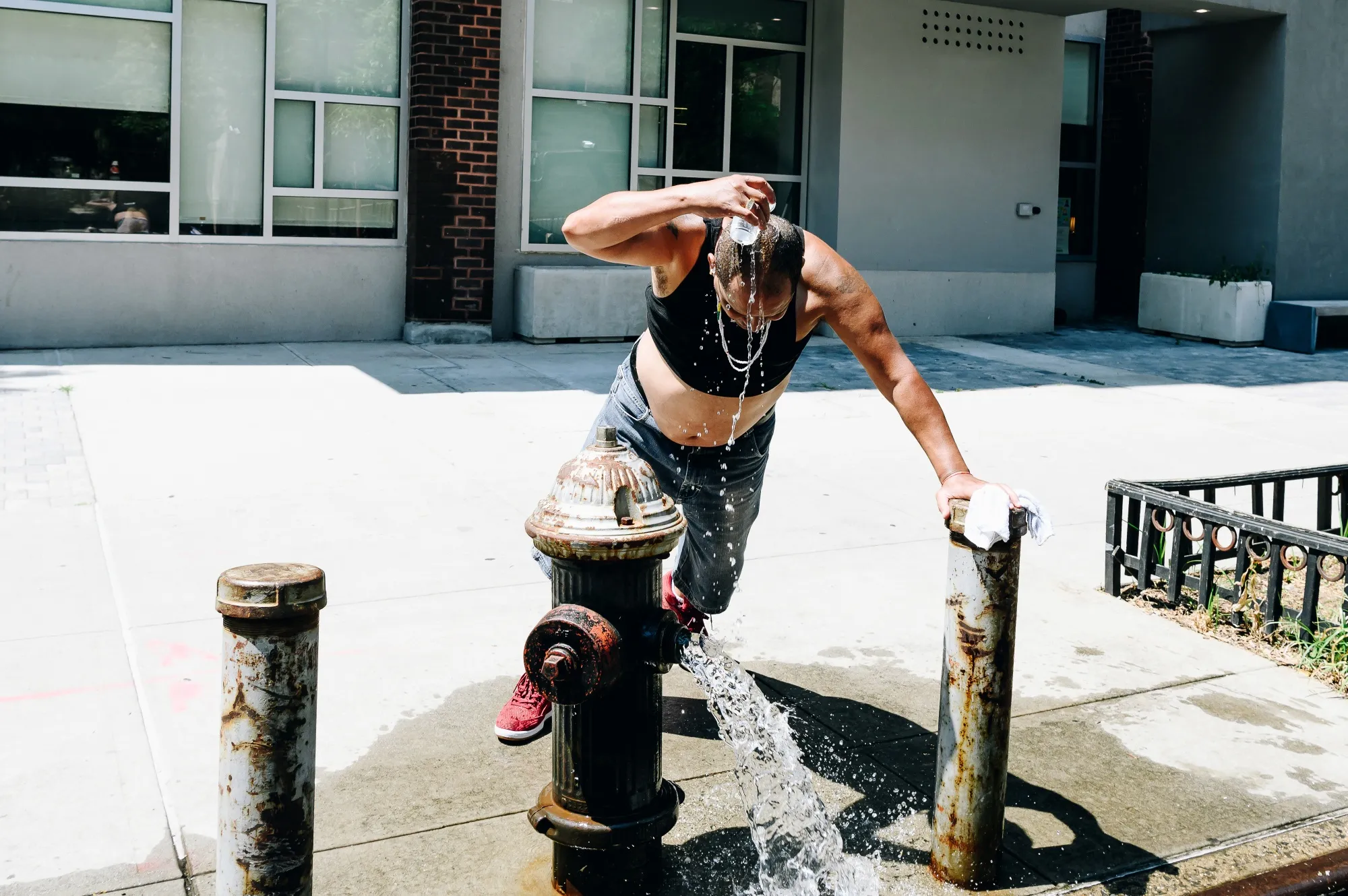 A pedestrian cools off during a heatwave in New York, U.S., on June 29.