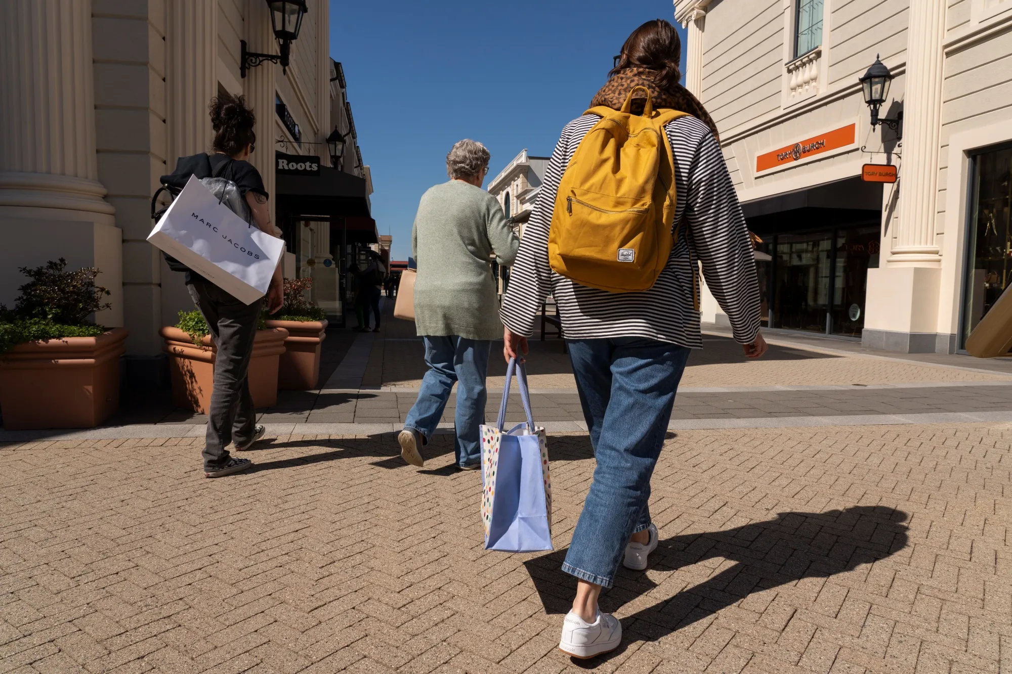 Shoppers at an outlet mall in Richmond, British Columbia.