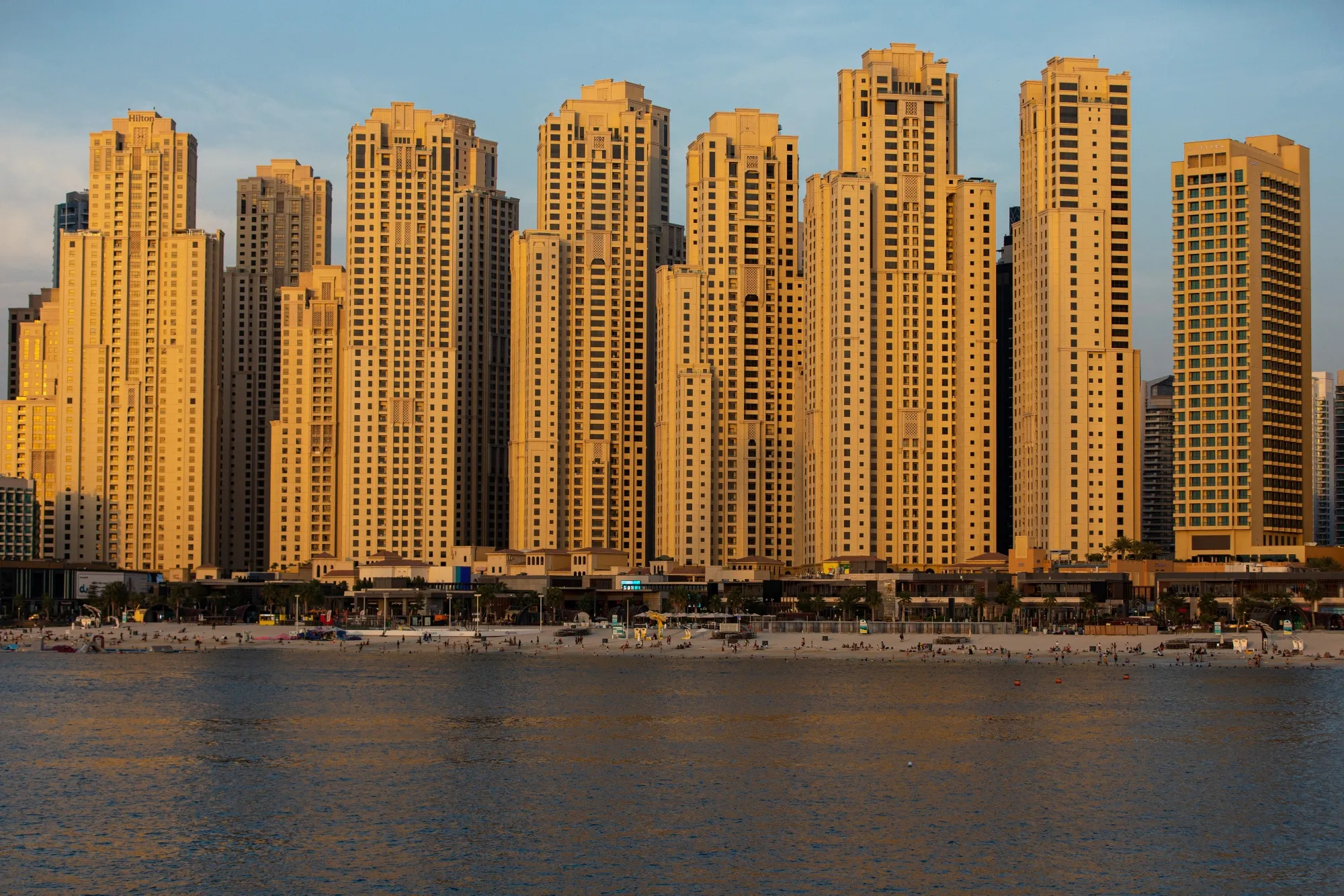 Residential towers stand in the Jumeirah Beach residence district in Dubai on June 8.