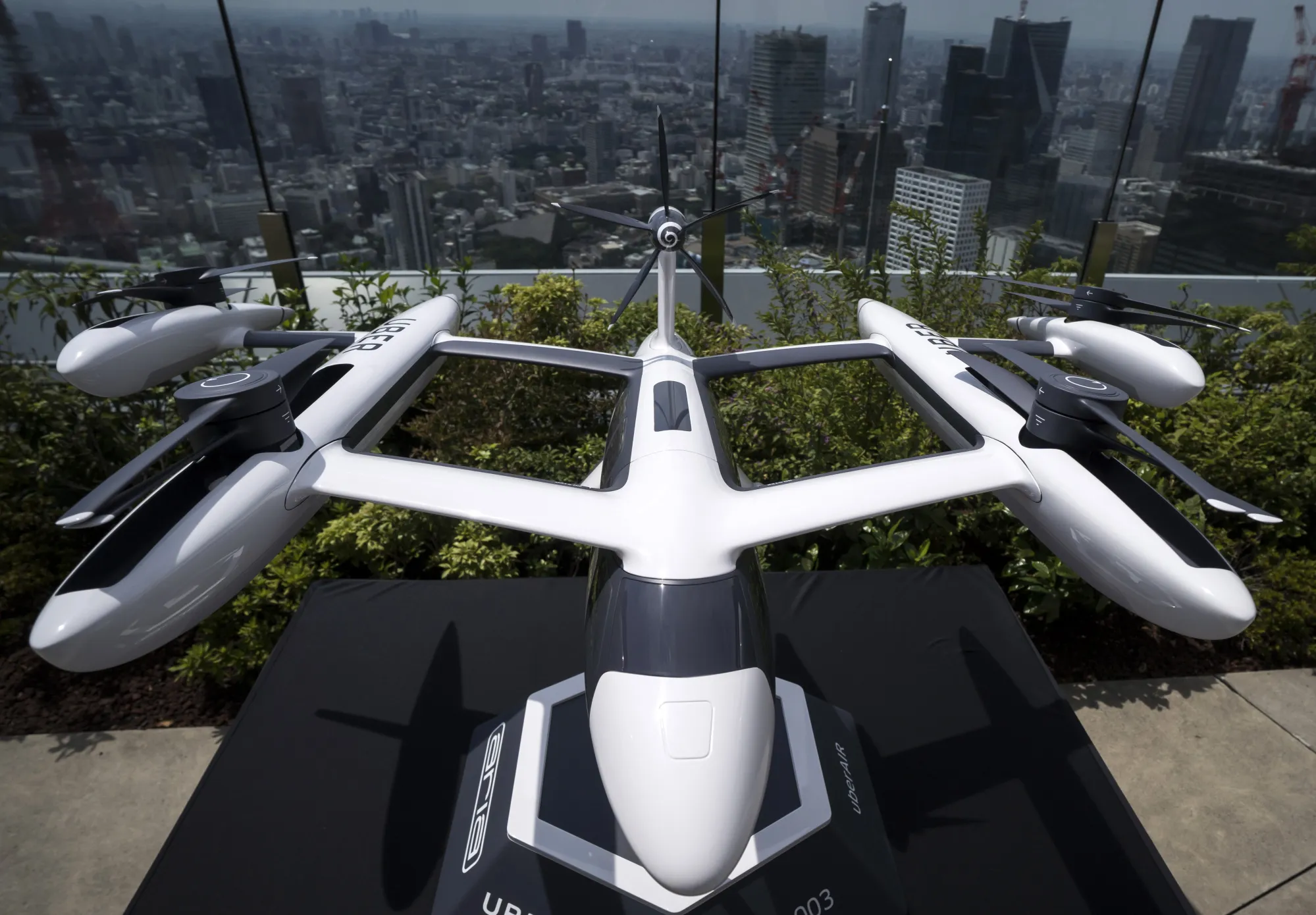 A scaled model of Uber's eCRM-003, an electric vertical take-off and landing jet.